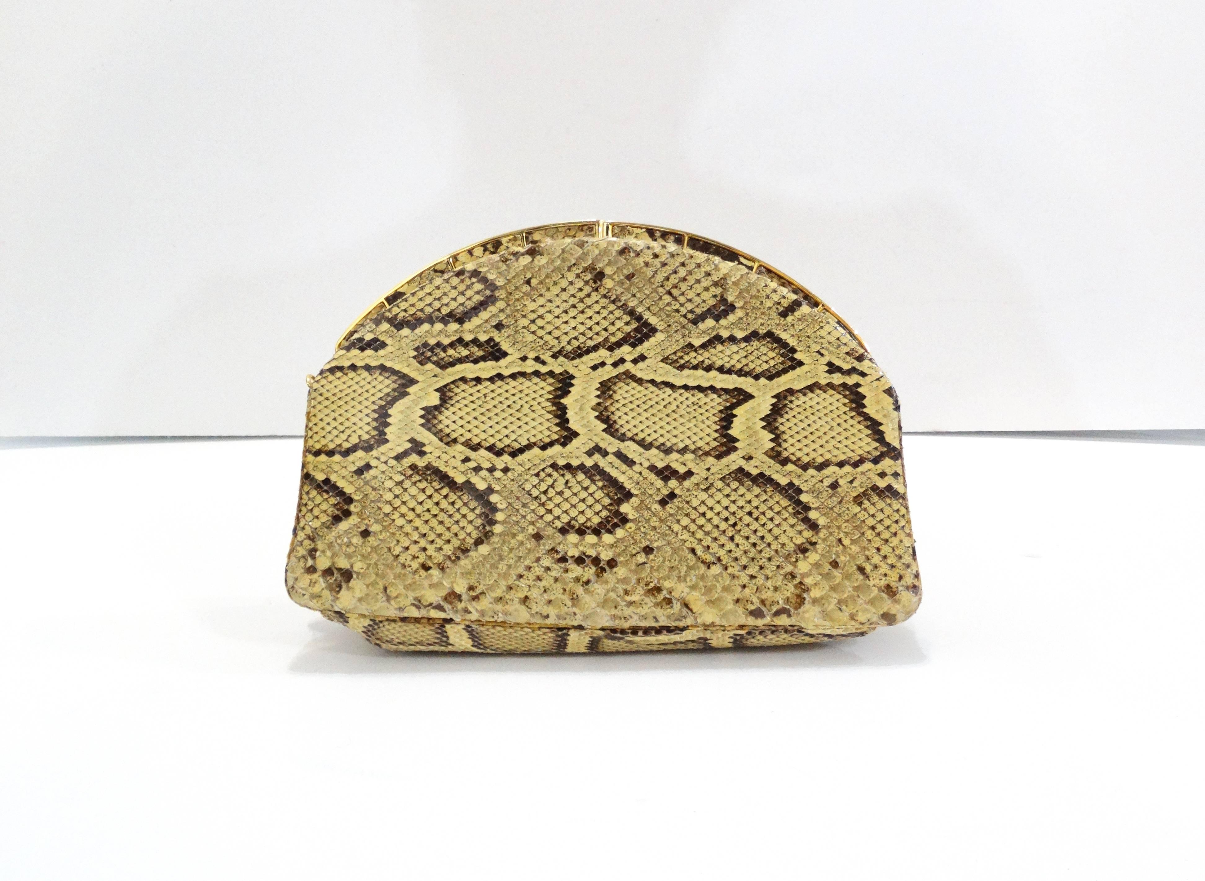 Gorgeous Judith Leiber evening bag made of genuine python snakeskin! Easily worn across the body with thin gold chain. Frame-type clasp closure that snaps open and closed. Chain is easily detached and tucked away for use as a clutch. Comes with it's