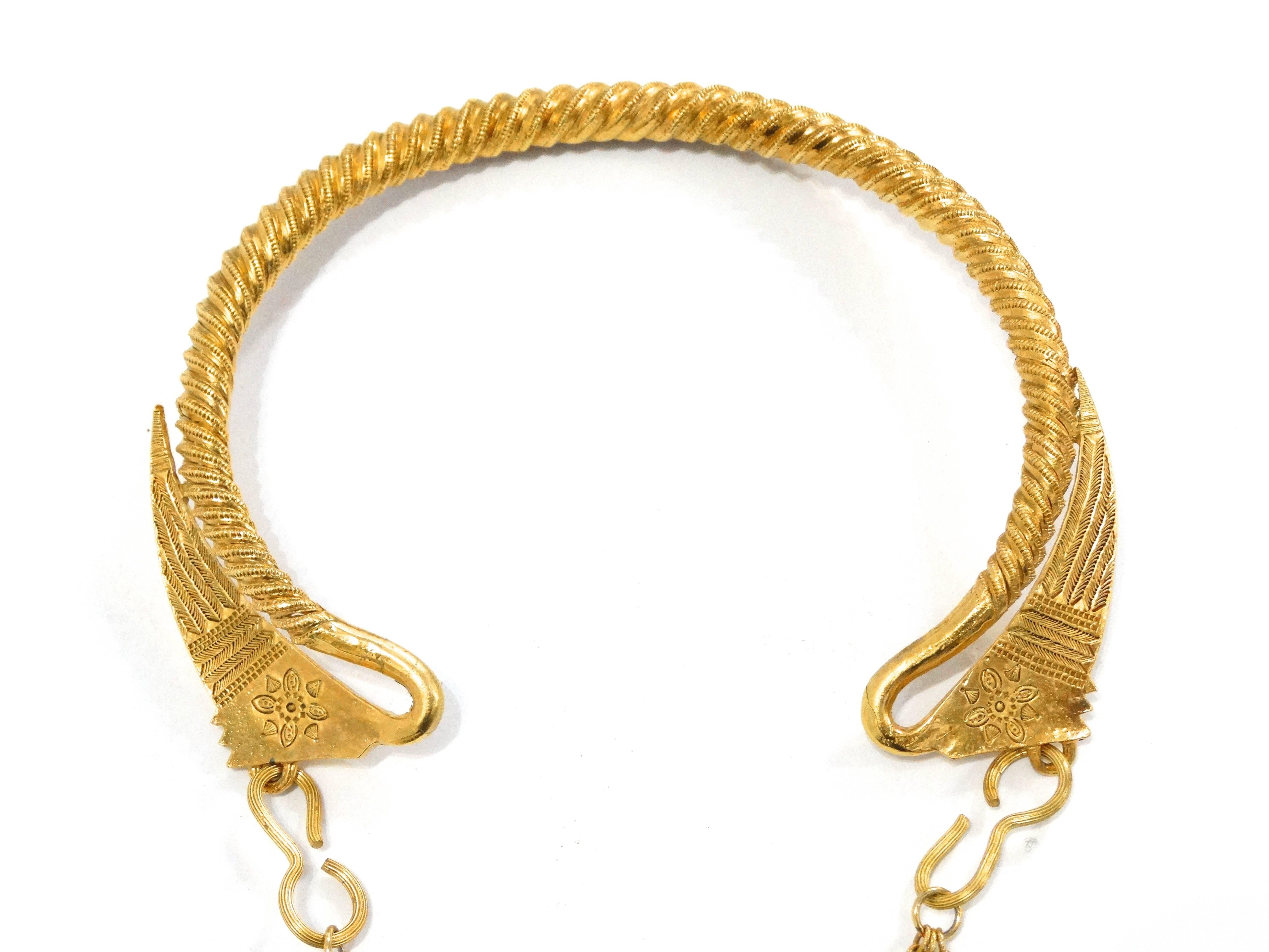 Stunning Alexis Kirk three tiered Egyptian Revial collar necklace. Glorious drops, each with fantastic symmetrical revial designed motifs. Collar necklace with side hooks for putting on and taking off. A beautiful statement piece. Plated Gold ,