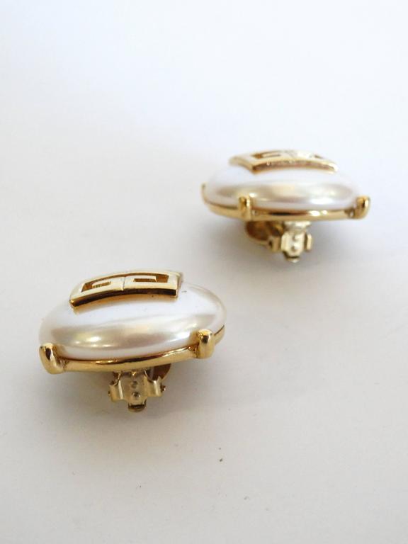 Rare 1980s Huge GIVENCHY Faux Pearl Logo Button Earrings at 1stDibs