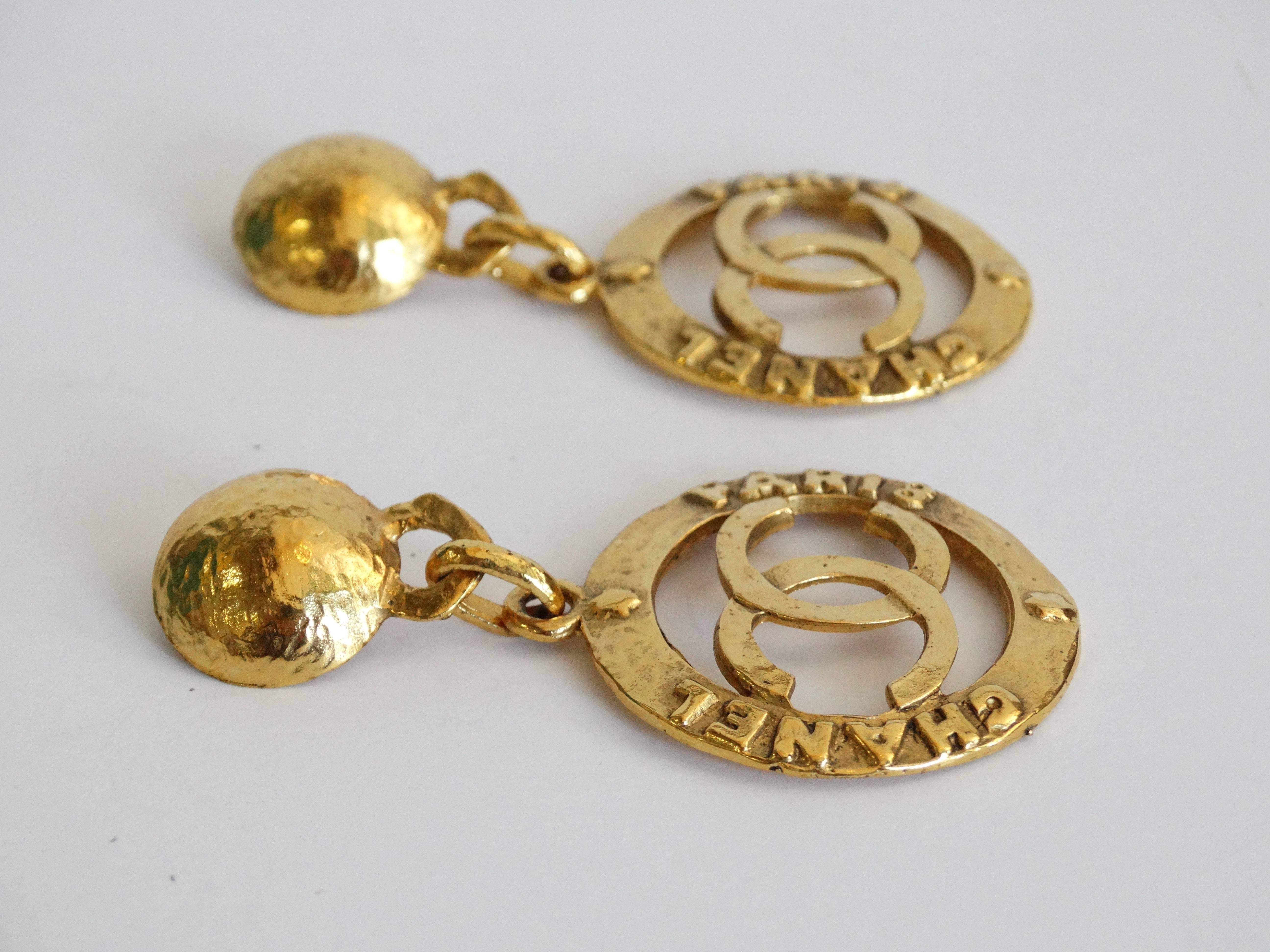 Karl Lagerfeld for CHANEL very rare heavily 18kt gold-plated large two-inch hoops. The earrings are positively stellar, huge hoops typical of Lagerfeld's over the top genius, with particular attention to details and workmanship...raised (embossed)