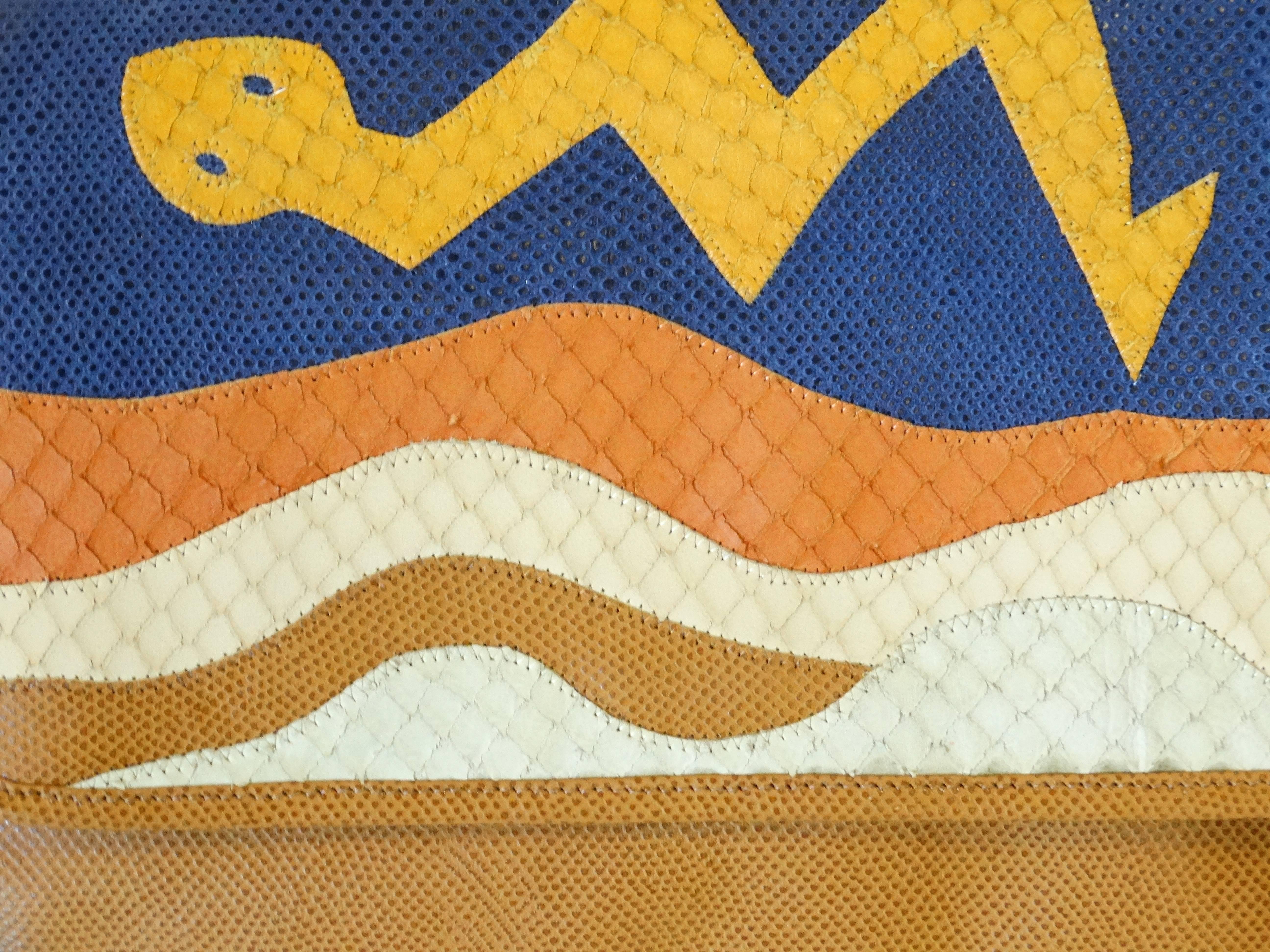 Wild Wild West... Gorgeous and unique vintage CARLOS FALCHI purse. This purse is made of leather and has a depiction of a snake on the front. The purse is in excellent condition with no damage. One interior zip pocket, signed lining
