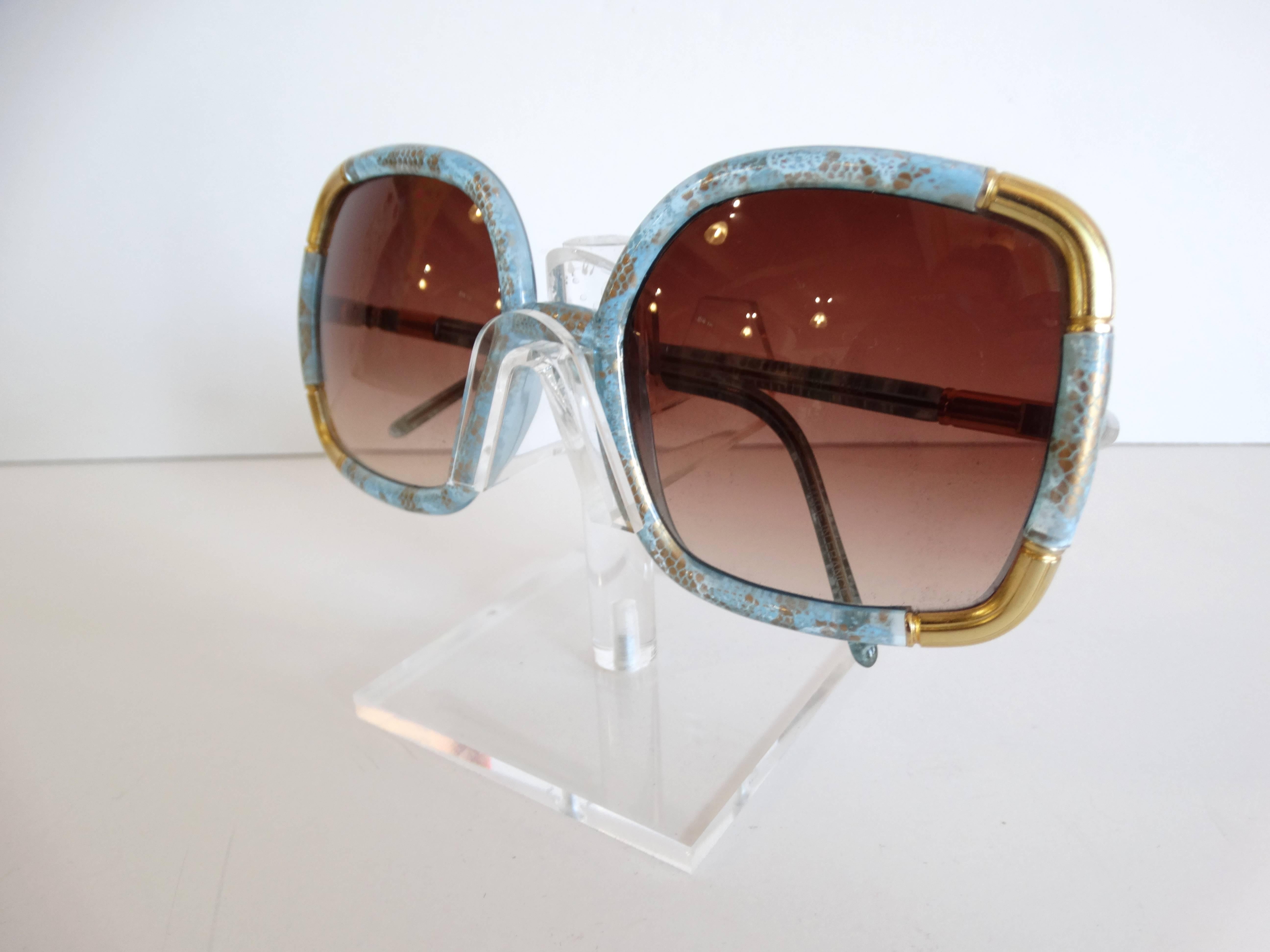 Super rare style of Ted Lapidus 1970's sunglasses. Blue gold lace print sunglasses with gold accents. 
Signed Ted Lapidus Paris. 