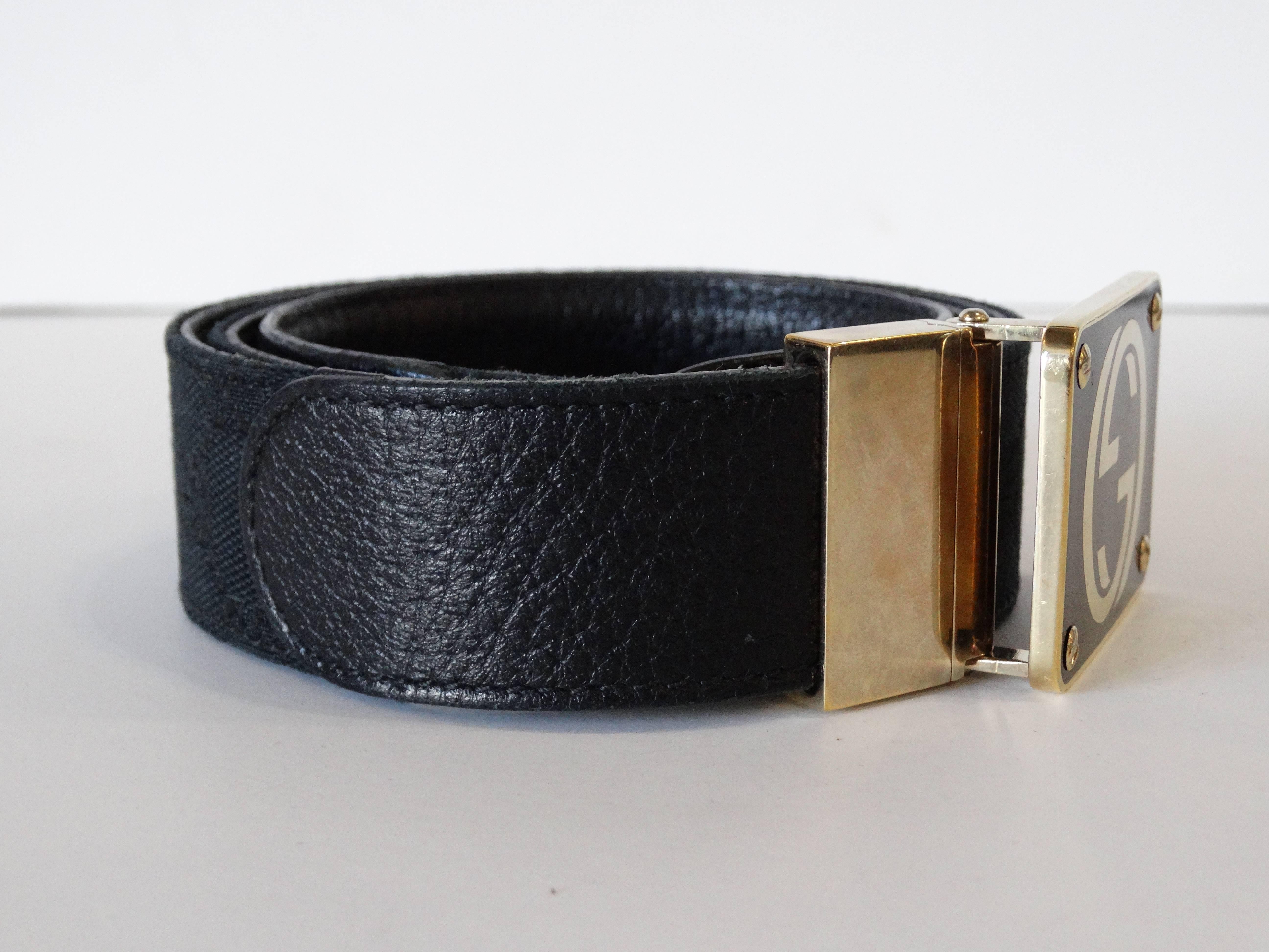 The perfect addition to your Gucci life wardrobe. This is a fabulous unisex Gucci enamel buckle and black monogram belt! Measures 34