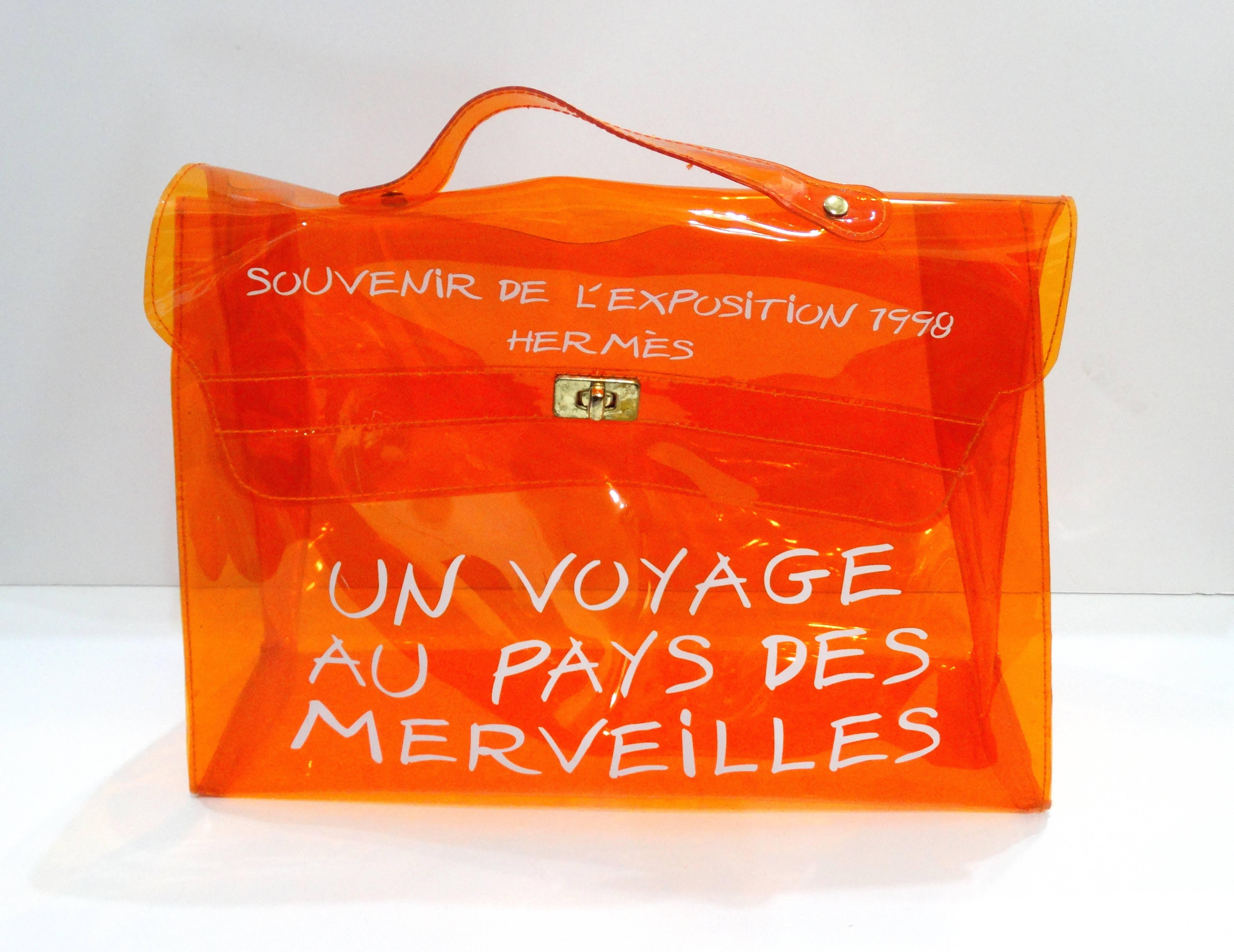Make a statement with this 1990s Hermes Souvenir Kelly bag! This piece is highly collectable- in the coveted orange color-way. These bags were limited edition, this color was made for the 1998 exhibition in Paris and carried only in Japanese stores.