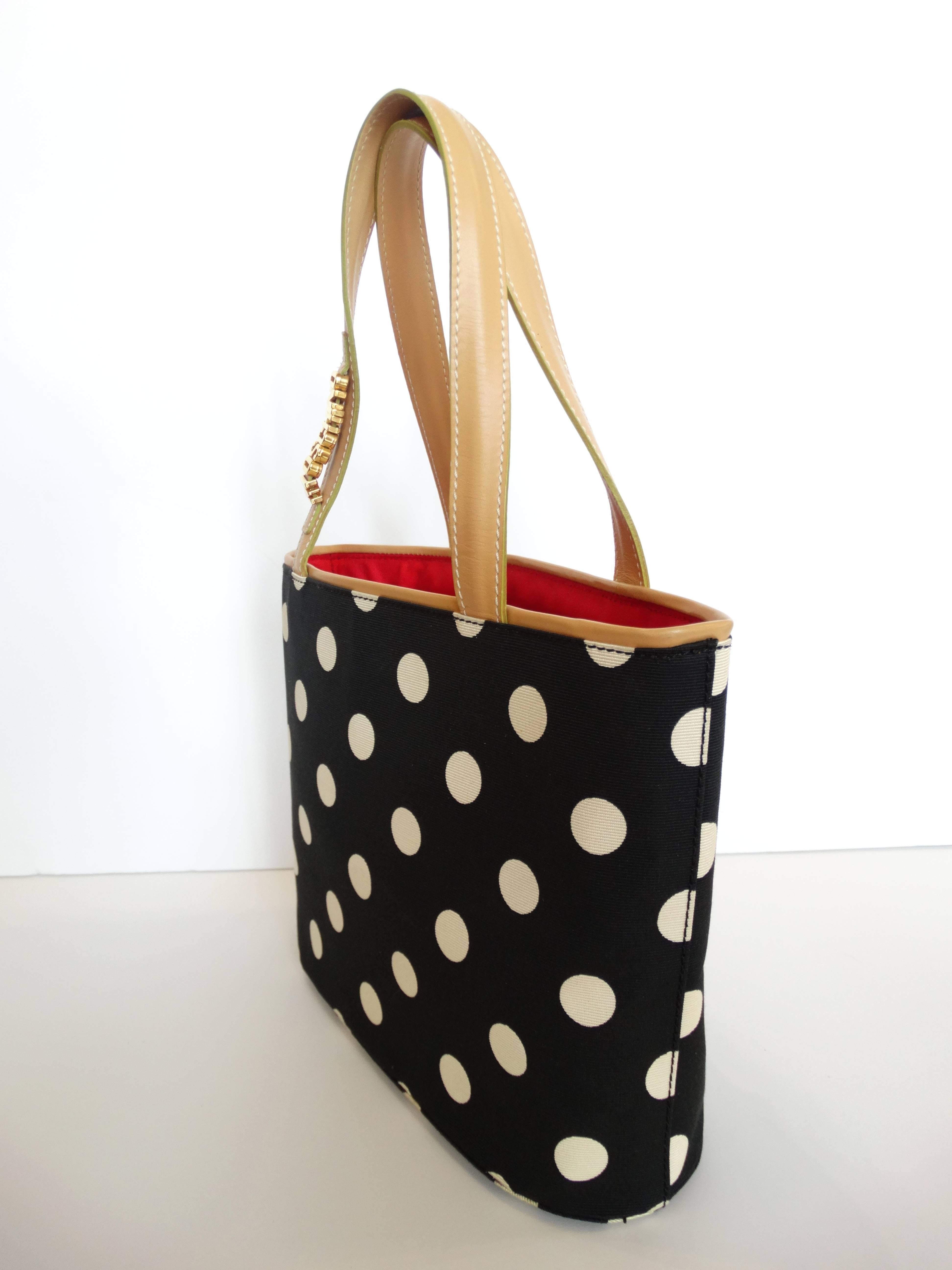 Adorable 1990s Moschino Couture! mini shopper bag! Black and white polkadot printed cloth exterior with creamy tan leather trim and handles. Bold 