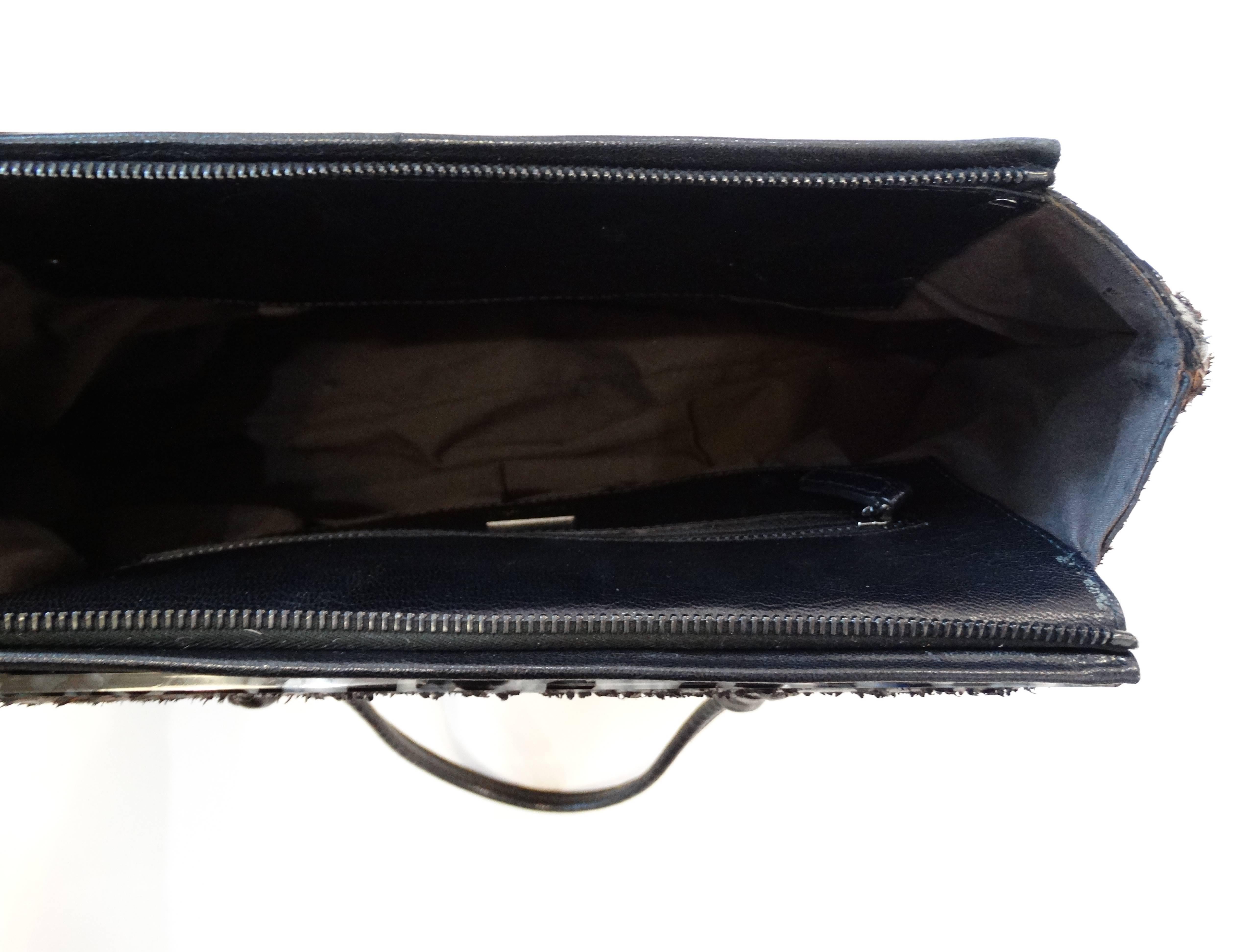 Incredible 1990'S Fendi Borsa Pochette to You bag! Hobo style with loose construction and top handle for easy carrying. Zips open at the top to reveal fully lined cloth interior and zipper pocket. Made of two contrasting calf skin leathers- accented