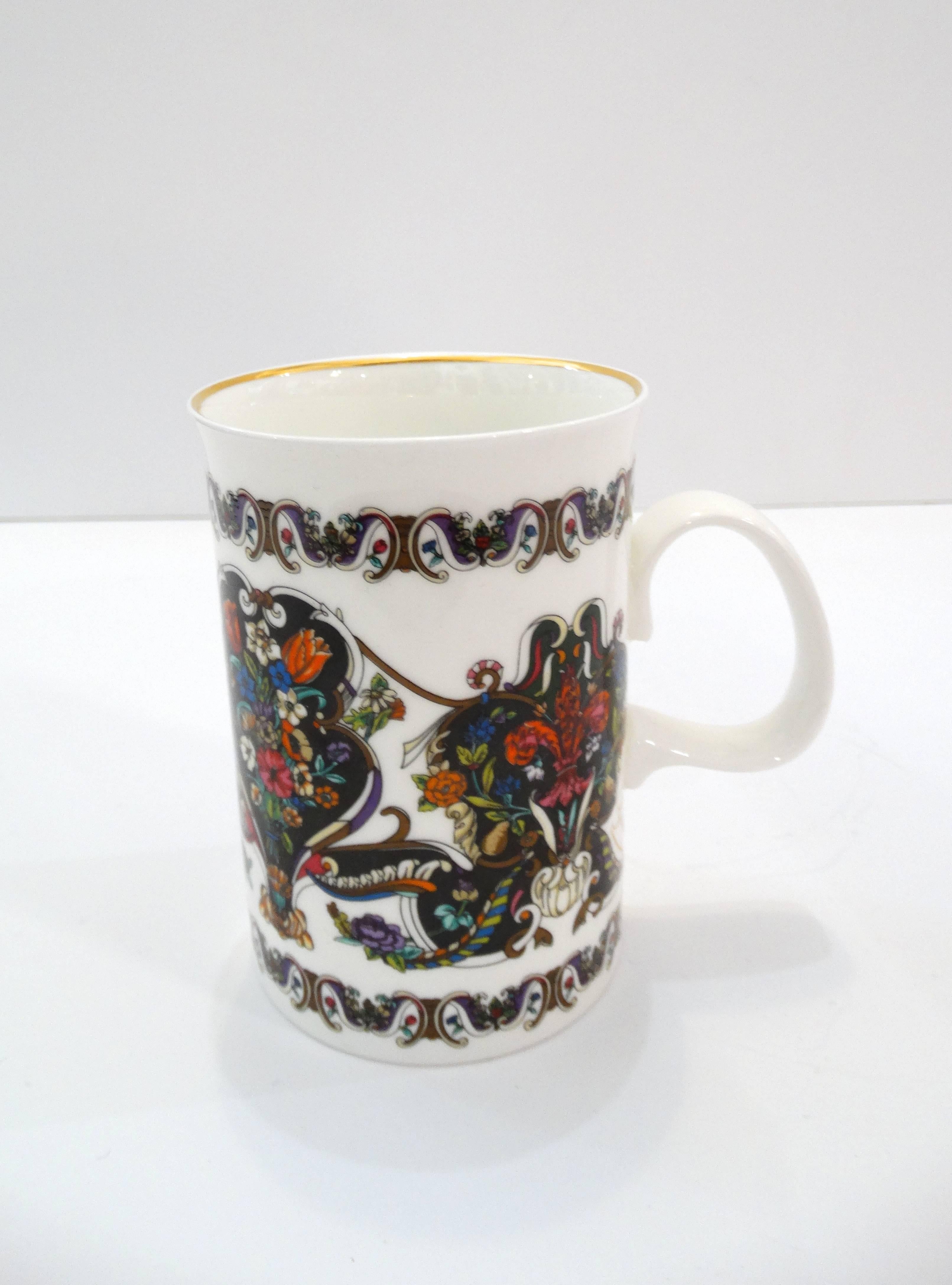 It's not enough to just wear Gucci- you have to drink Gucci too! Sip in style with our Gucci China set! 6 white china mugs with botanical gucci designs on each. Green velveteen lined box in the signature gucci green color. Closure slightly damaged,