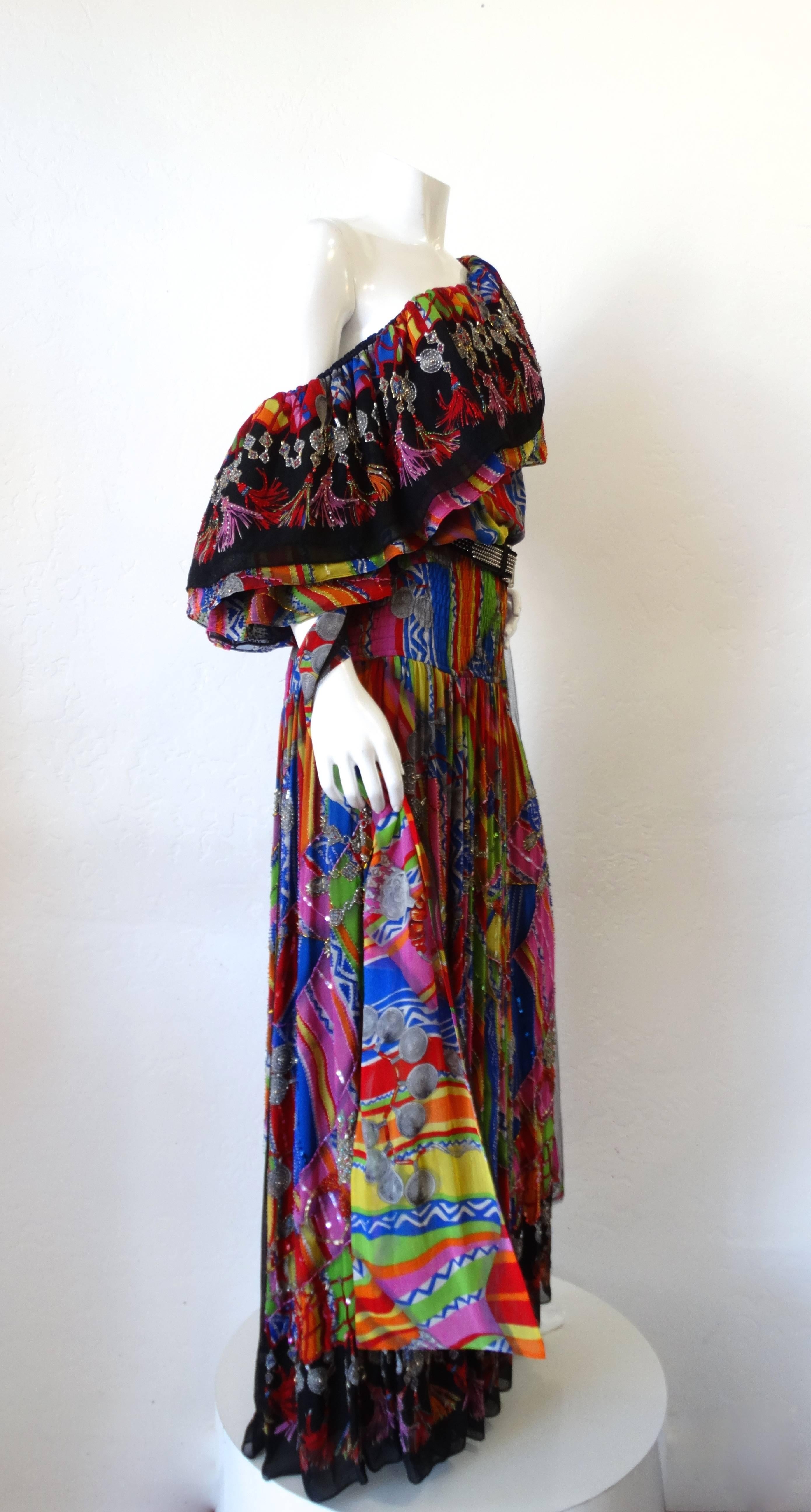 Channel your inner flamenco dancer in our 1980s Diane Freis dress! Sexy off the shoulder neckline with layered ruffles and tassel print for extra drama! Elasticized waist and carwash style skirt, so much movement in this piece! Psychedelic rainbow