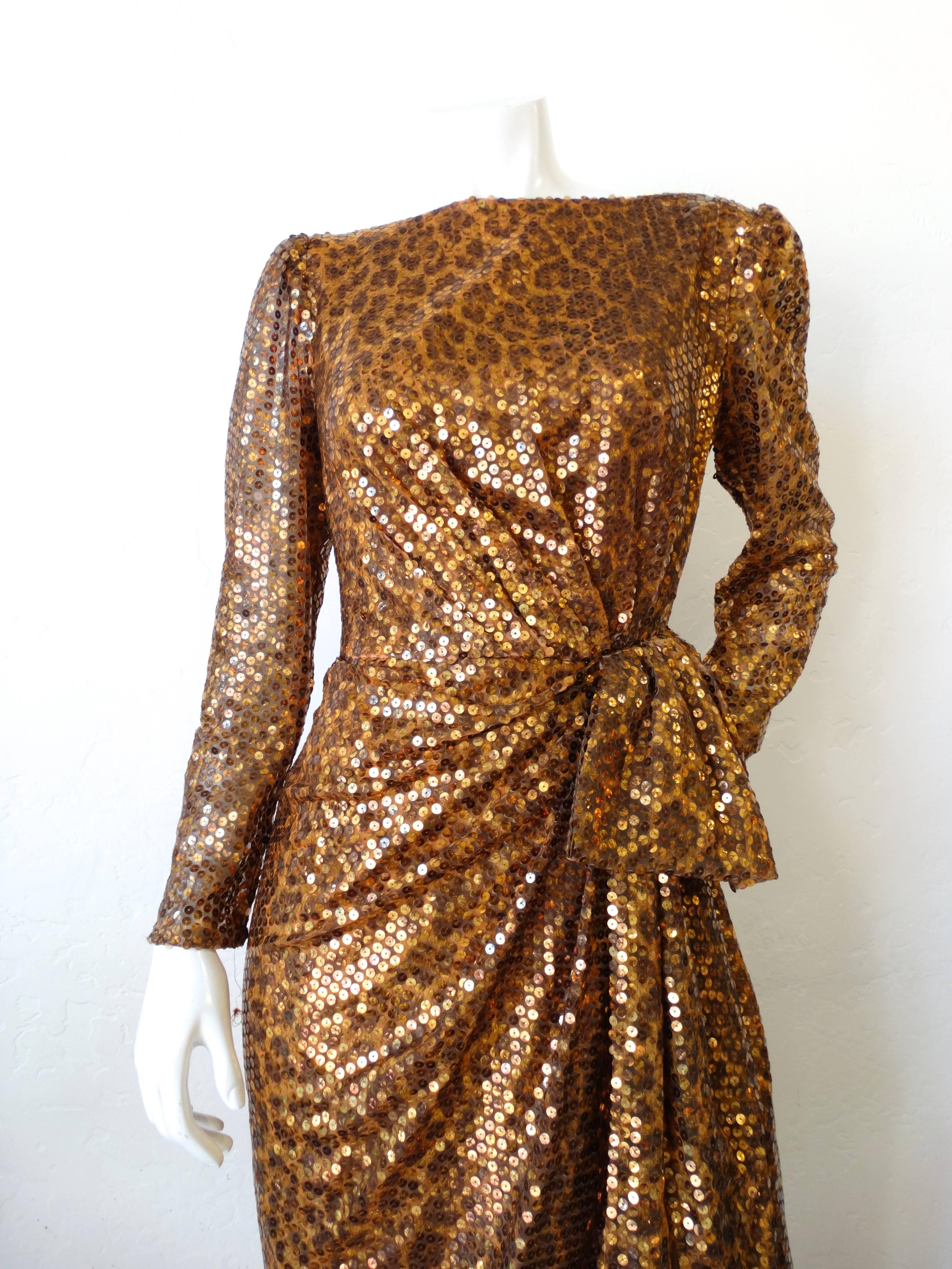 What's better than leopard? Leopard AND sequins of course! Rock the holidays in our incredible 1980s Saks Fifth Avenue x Mignon dress! Made of a subtle leopard fabric bedazzled completely in iridescent gold sequins. The fit of this dress is