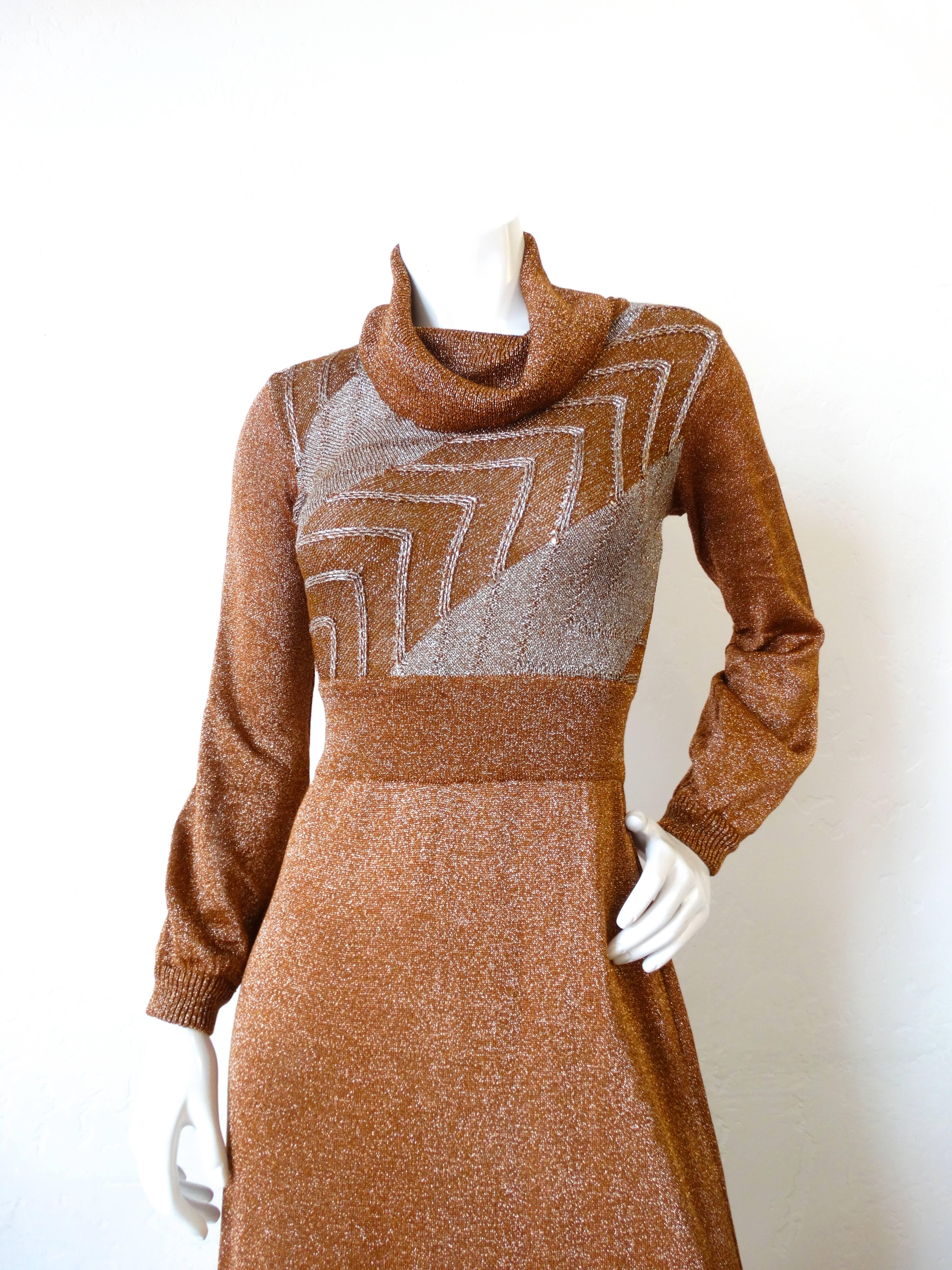 Rock some 1970s goodness this holiday season with our Wenjilli gown! Made of a super metallic lurex knit fabric in shades of silver and bronze. Chevron stripe pattern on the bodice with a banded waist. Gathered turtleneck-like neckline. Sleeves