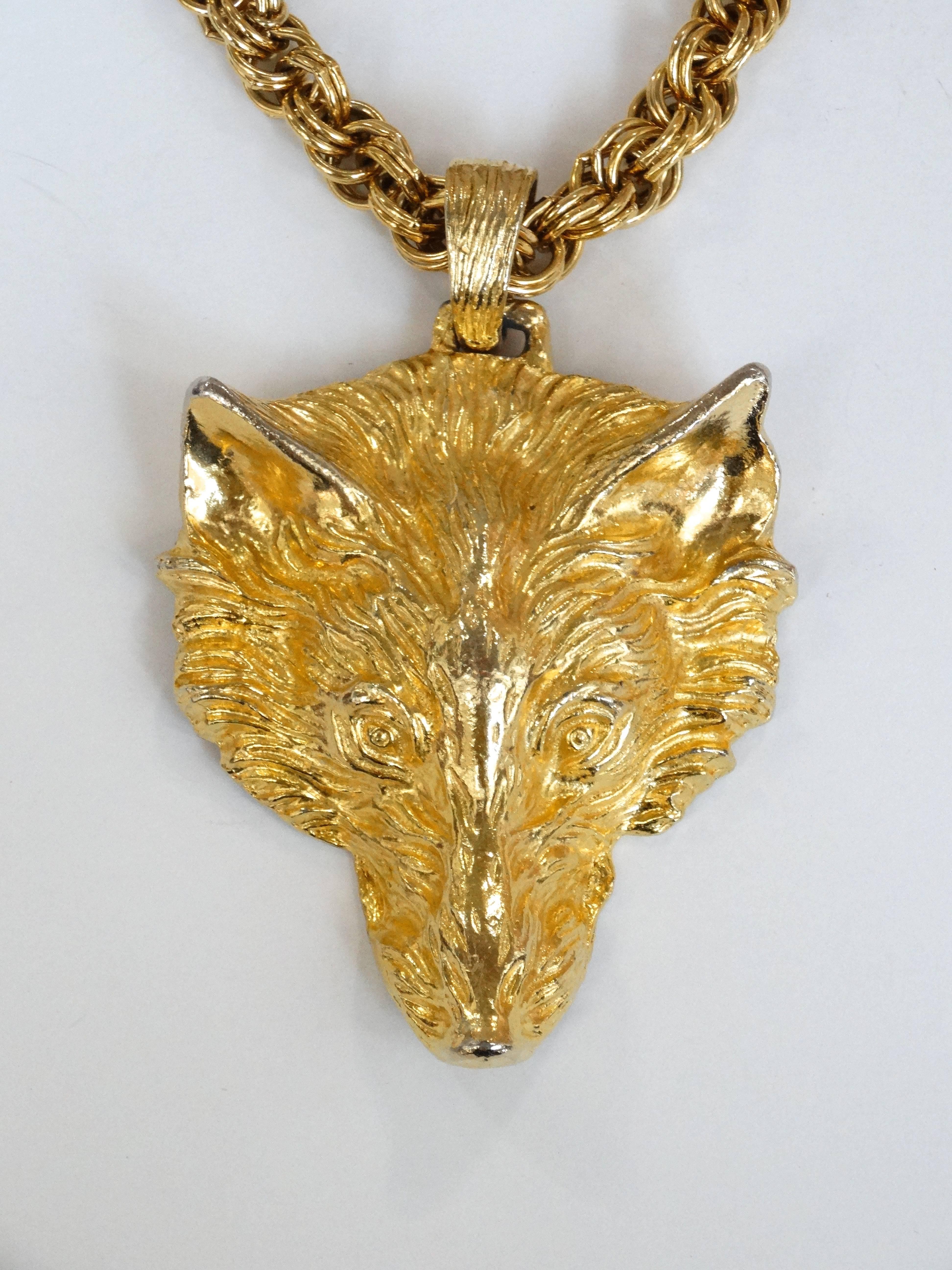 The most amazing 1960s fox pendant! Intricately detailed oversized fox head pendant with woven braided gold chain. Unsigned but clearly of designer quality, heavy weight gold toned metal. 

Width: 2.5 in 
Length: 4 in
Chain length: 16 in