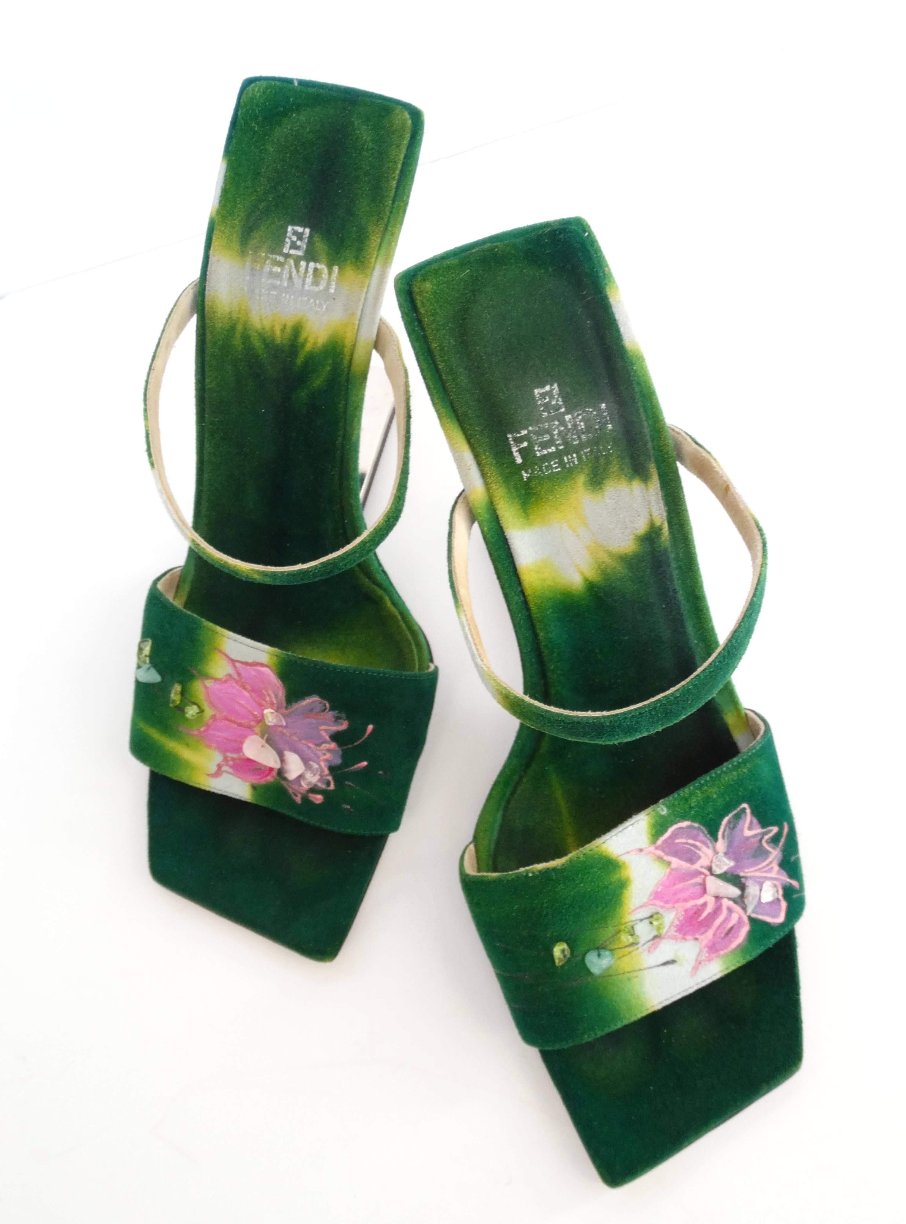 Out of this world Fendi heels! Ombre green suede leather with hand-painted flowers across the top of the sandal. Amazing anti-gravity silver heels. Marked a size 38.5. 

Heel Height 3.5 in 
Insole Length: 9.5 in 