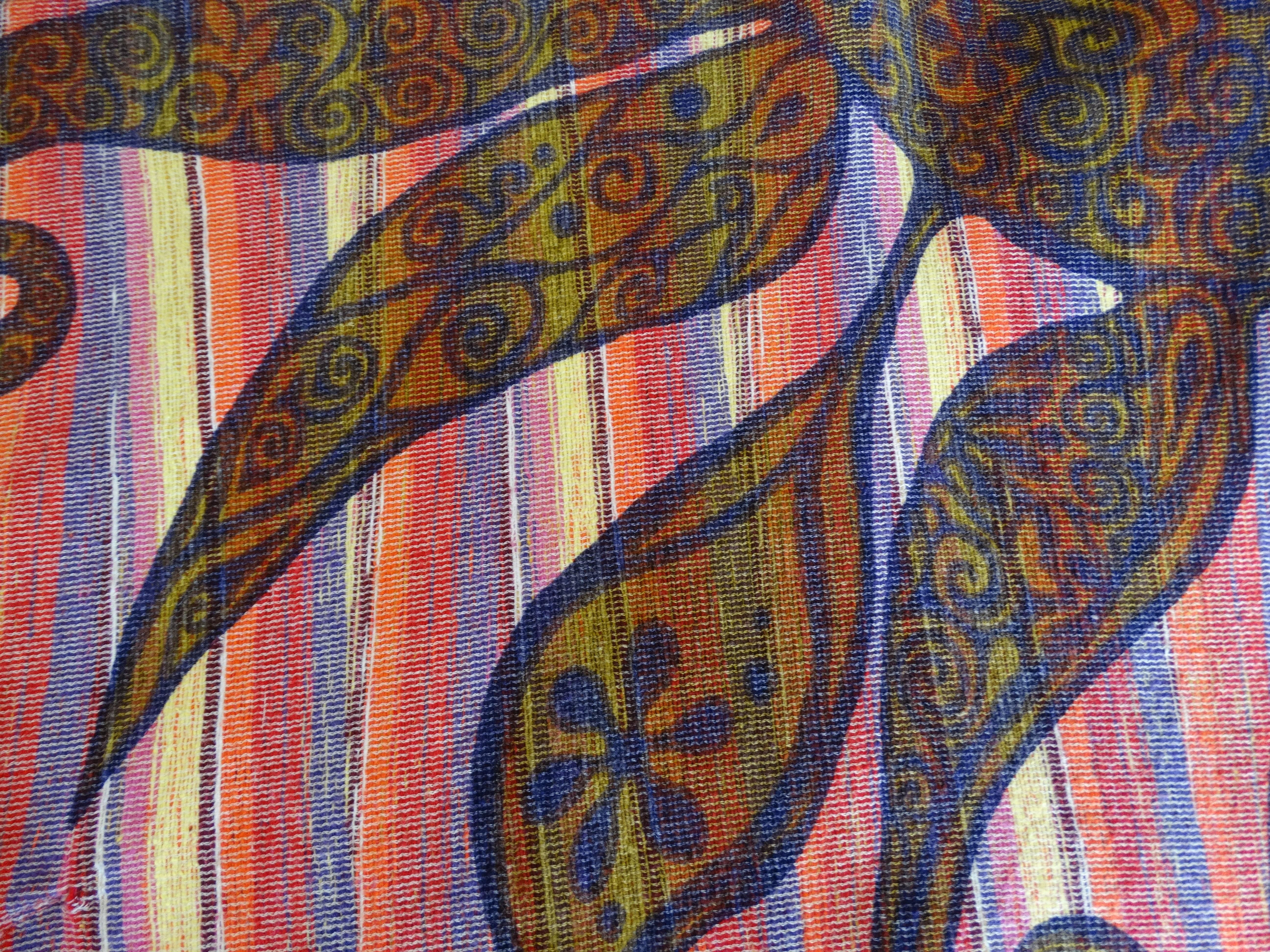 We've got Rikma fever- and you will too with our 1970s Rikma top! Multicolored striped pattern on their signature thick woven cotton fabric. Embellished with an intricate henna-like print around the neckline and shoulders. Bell sleeves stylishly