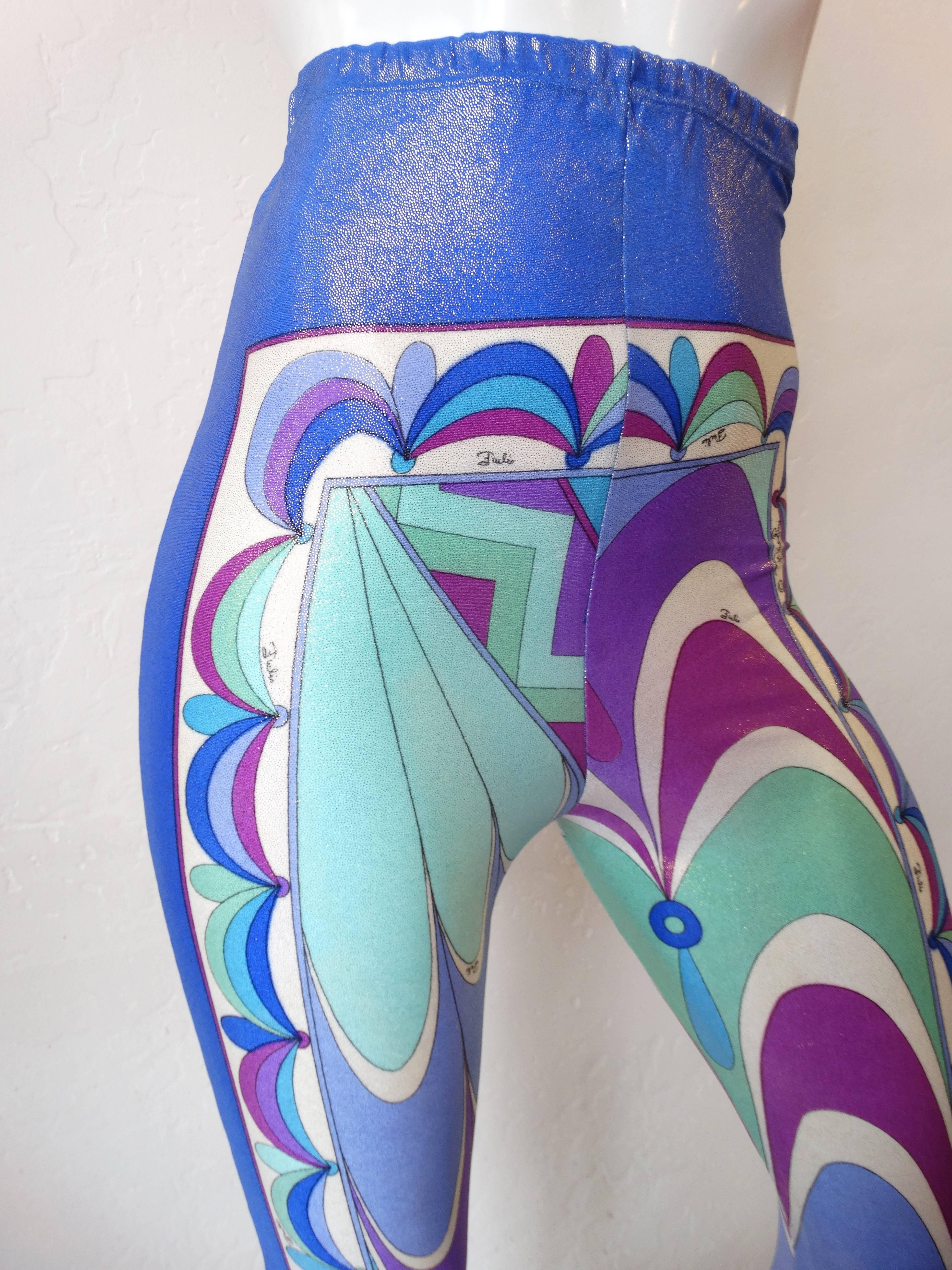Incredible 1960s high rise leggings from iconic designer Emilio Pucci! Made of super stretchy iridescent fabric printed with the signature Pucci swirls- in shades of blue, teal, and violet. Elasticized waist allows for a customized fit. Original