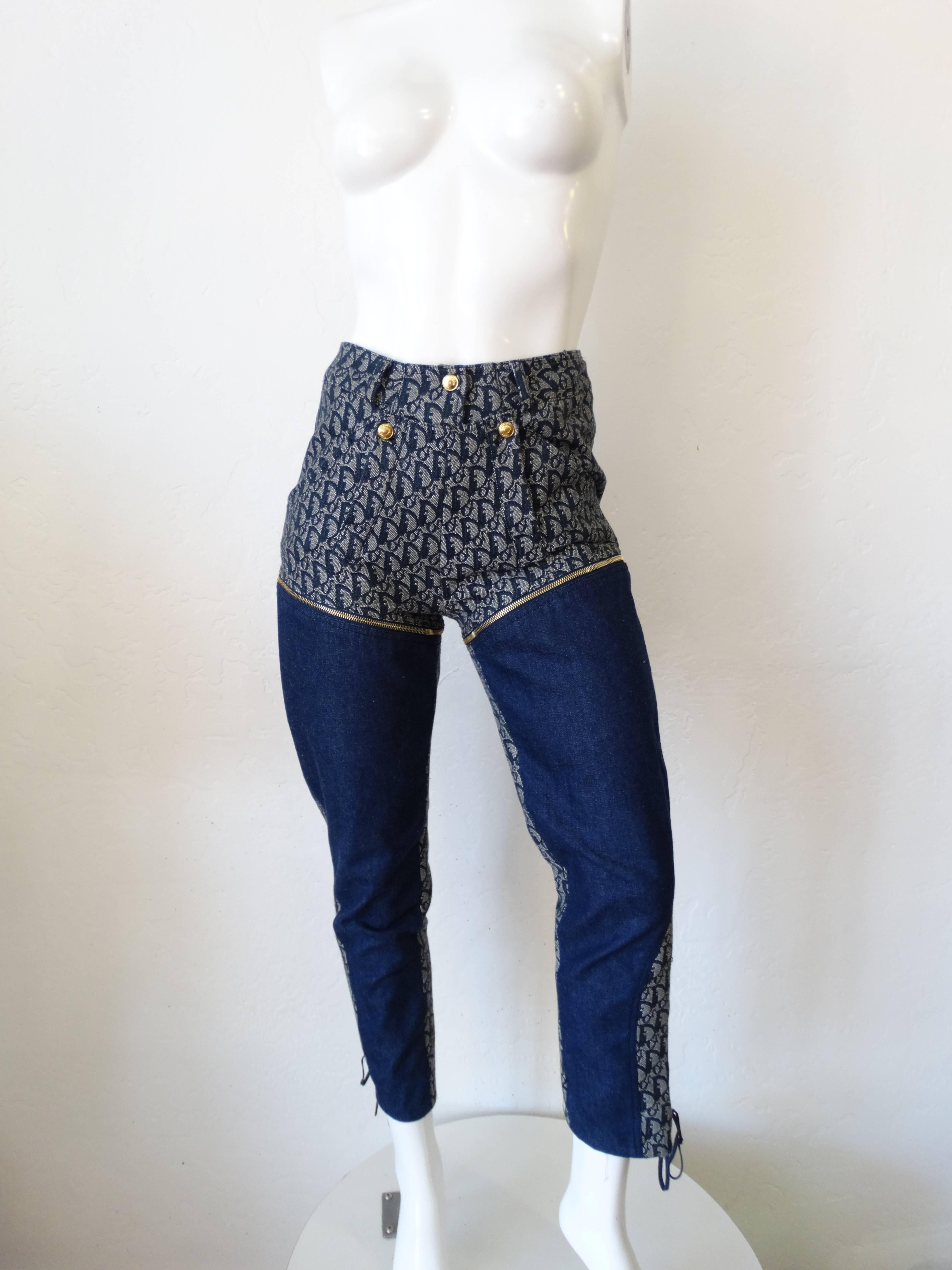 Snag yourself an amazing piece from the John Galliano Era of Christian Dior! These are no ordinary jeans- they're convertible! The pant legs zip off at either side of the thighs to reveal a pair of short-shorts! Classic Dior Monogram print in a true
