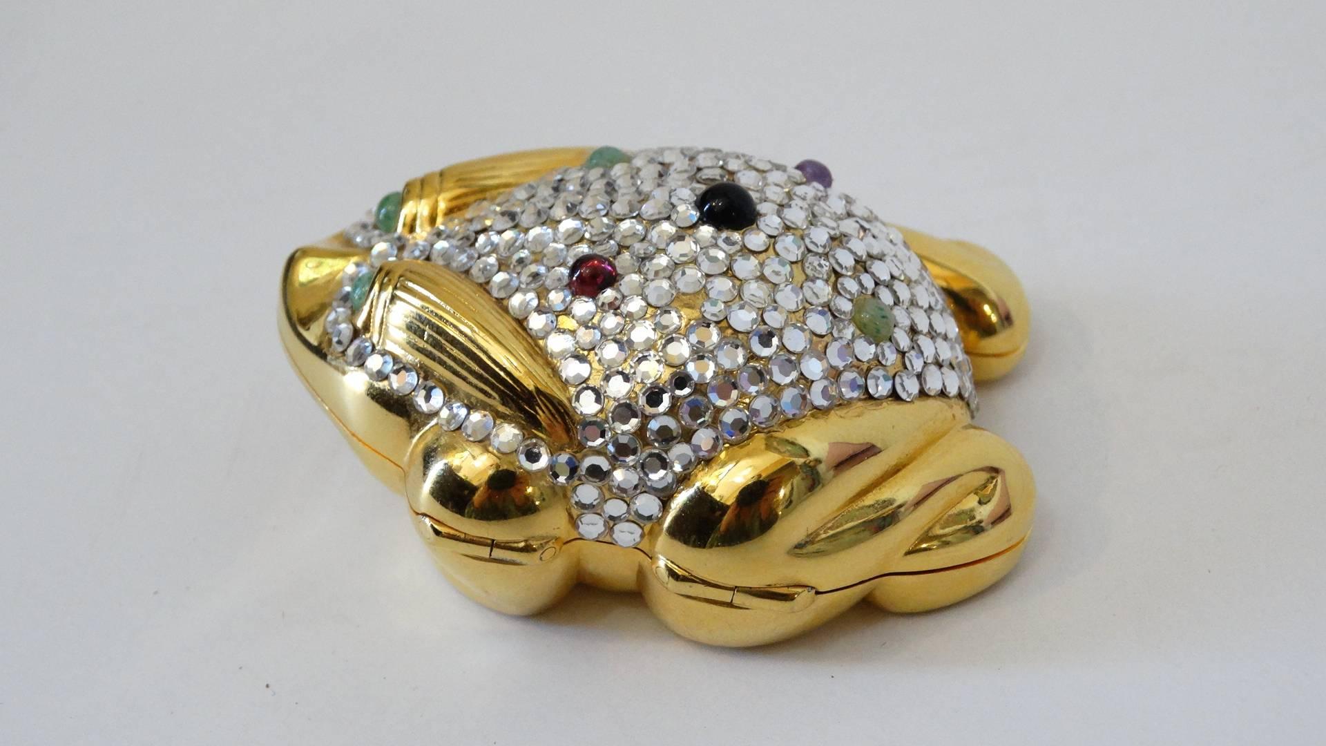 Rare 1984 Judith Leiber frog Pillbox with multi color Jade, Amethyst and Onyx stones with a push-lock closure.  Gold Plated hardware encrusted with Austrian Swarovski Crystals. Judith Leiber Signature inside Circa 1984. 

 0.9