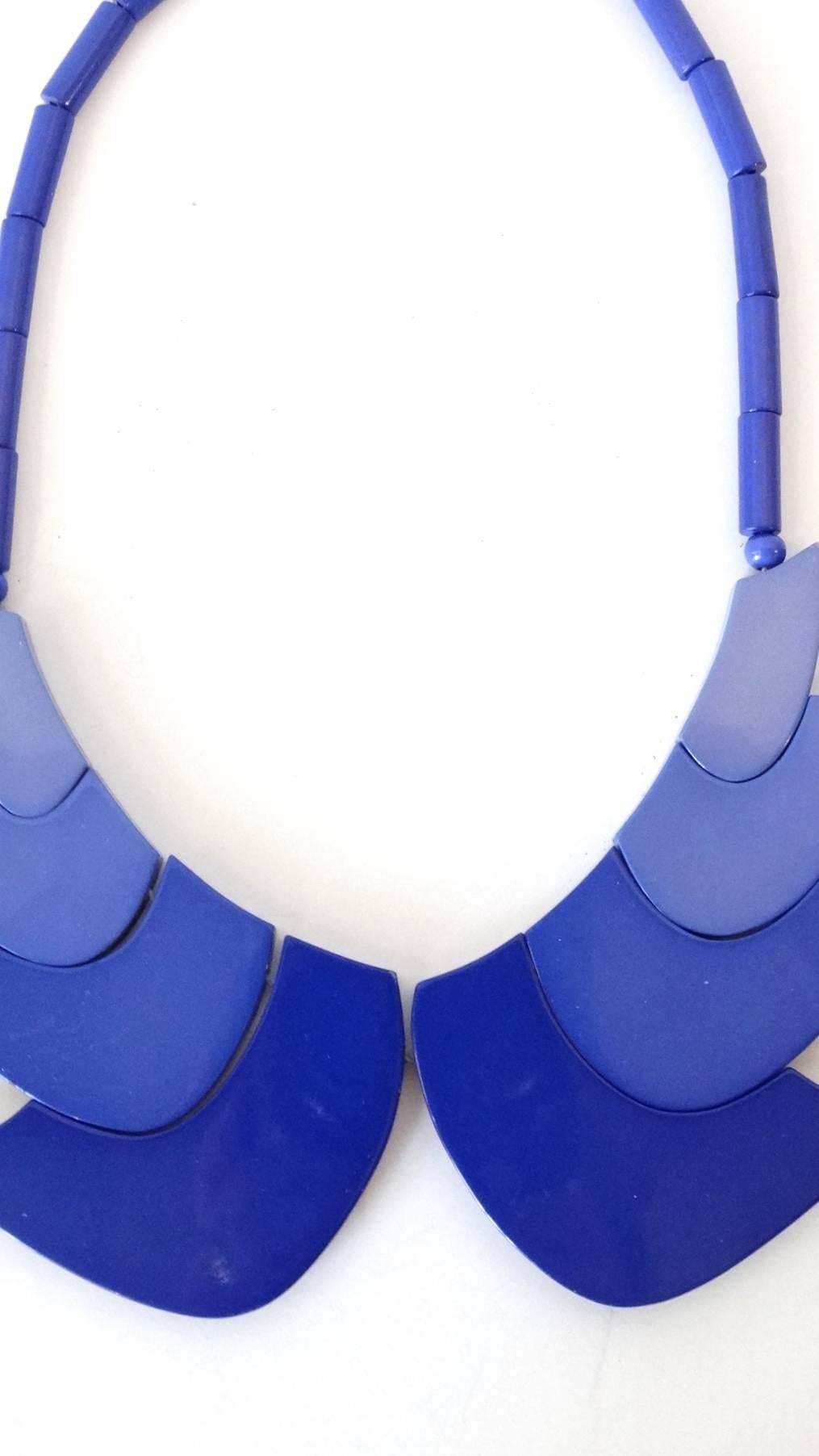 1970s bakelite necklace from none other than Guillemette L'Hoir Paris- designer of avant-garde art inspired jewelry made from Galalith. This piece is made out of various shades of Galalith blue arranged in a wavy, Peter-pan collar like structure.