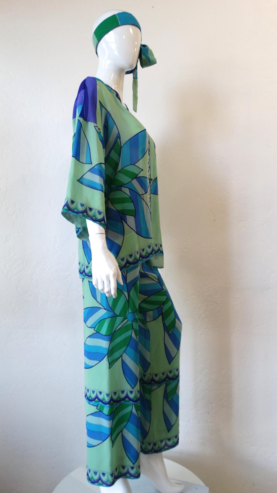 Emilio Pucci silk twill evening pajama in beautiful color way turquoise, blue hues and mint green with punches of purple, from the 1960s...Blouse top closes with buttons and a covered placket, round banded neckline and full 3/4 length sleeves...The