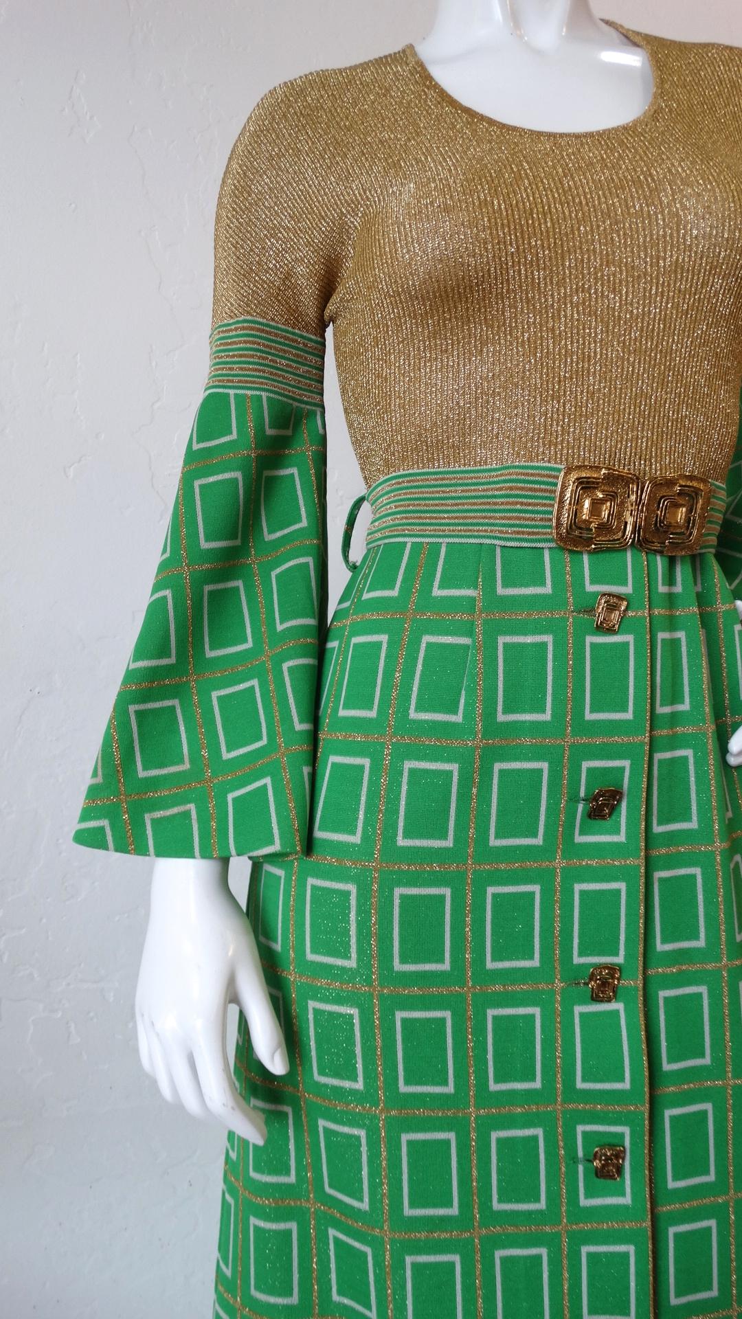 Rock some vintage evening wear with our incredible 1960s lurex dress from Israeli designer Aled Couture! Gold lurex knit bodice contrasted by green and gold geometric printed flounce sleeves! Matching printed maxi length skirt with gold metal