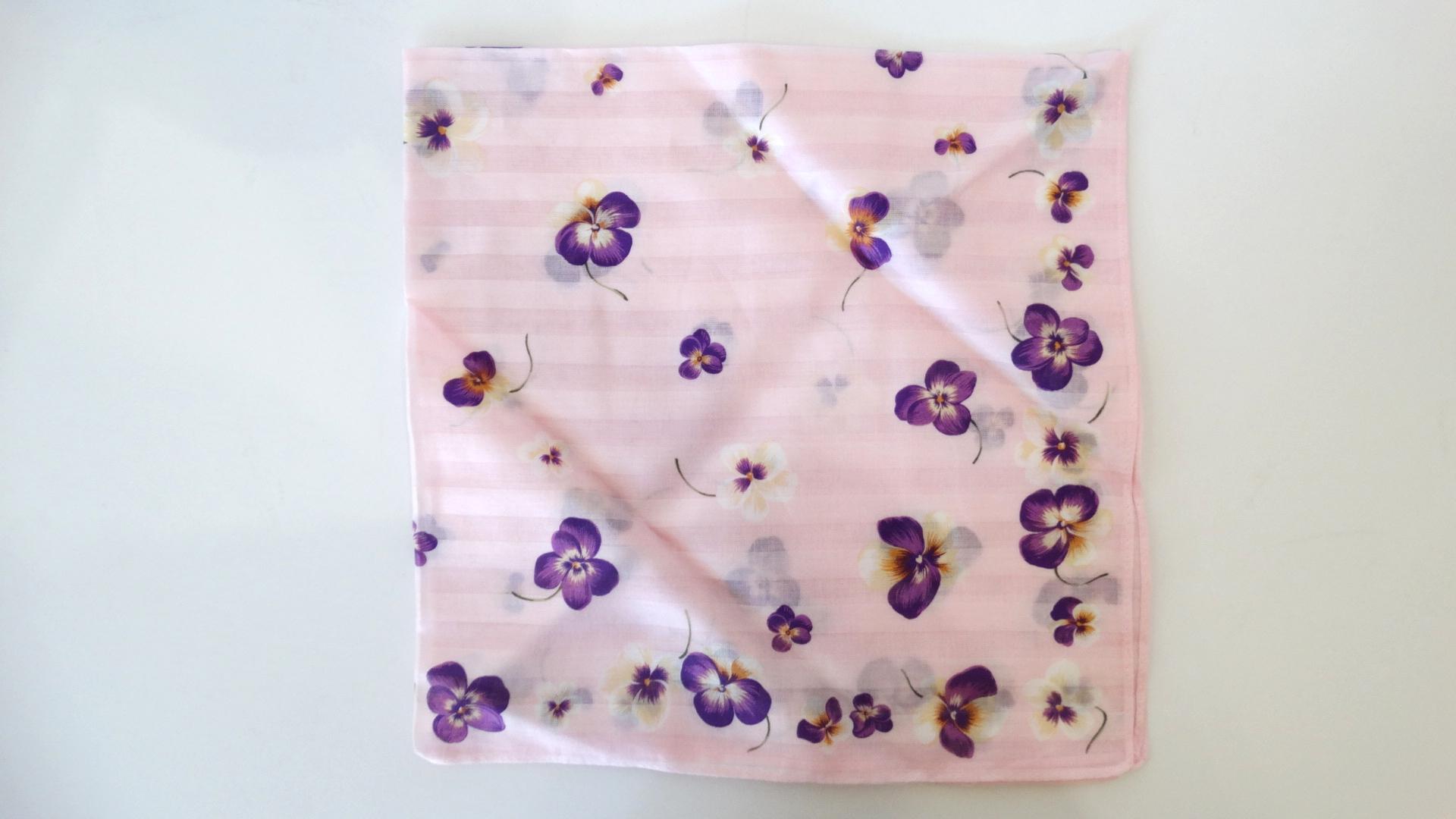 Precious floral printed handkerchief from designer Hanae Mori! Pale pink background with violet, white and yellow pansy flowers printed all over. 