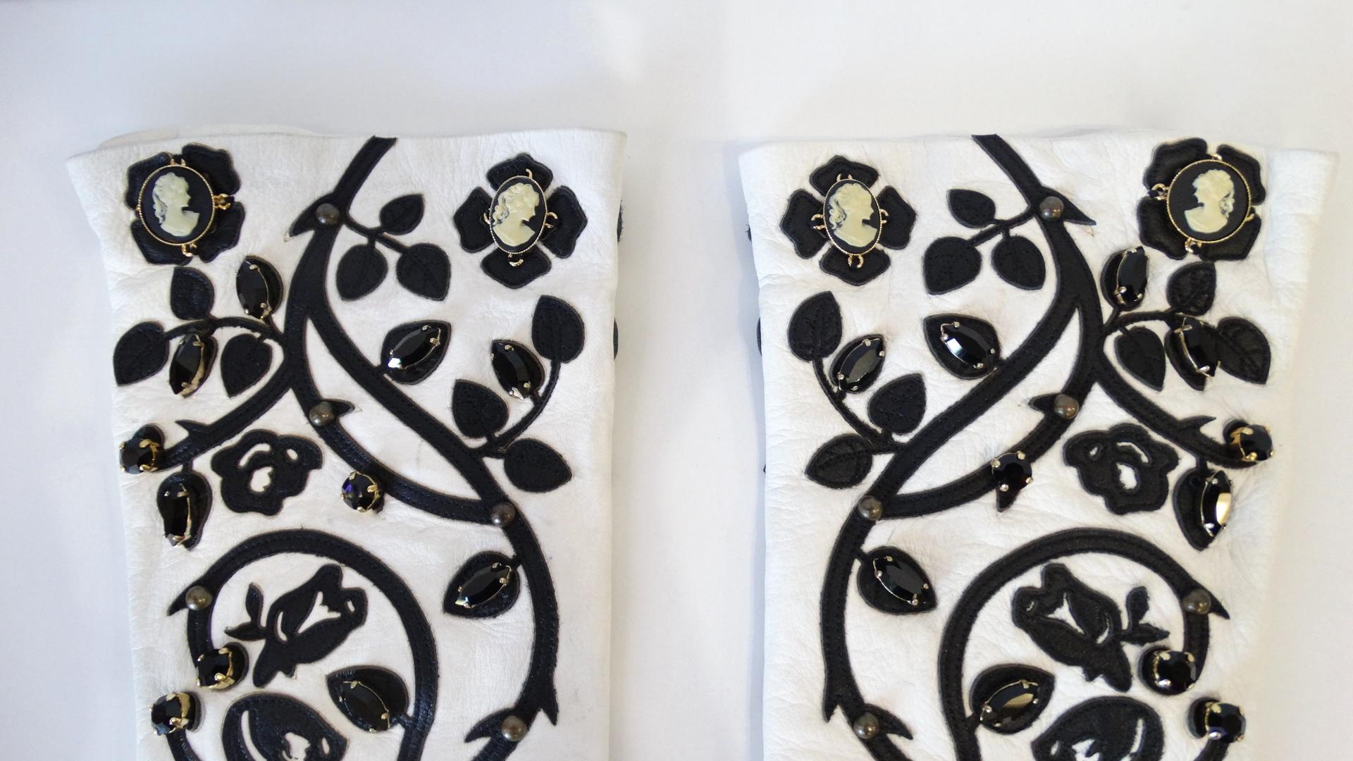 If You Don't Wear Gloves, Now Is The Time To Start! Circa 2000s, these white leather elbow gloves are limited edition from Dolce & Gabbana's mainline (runway) collection. They feature a gorgeous embroidered vinery pattern which is decorated with