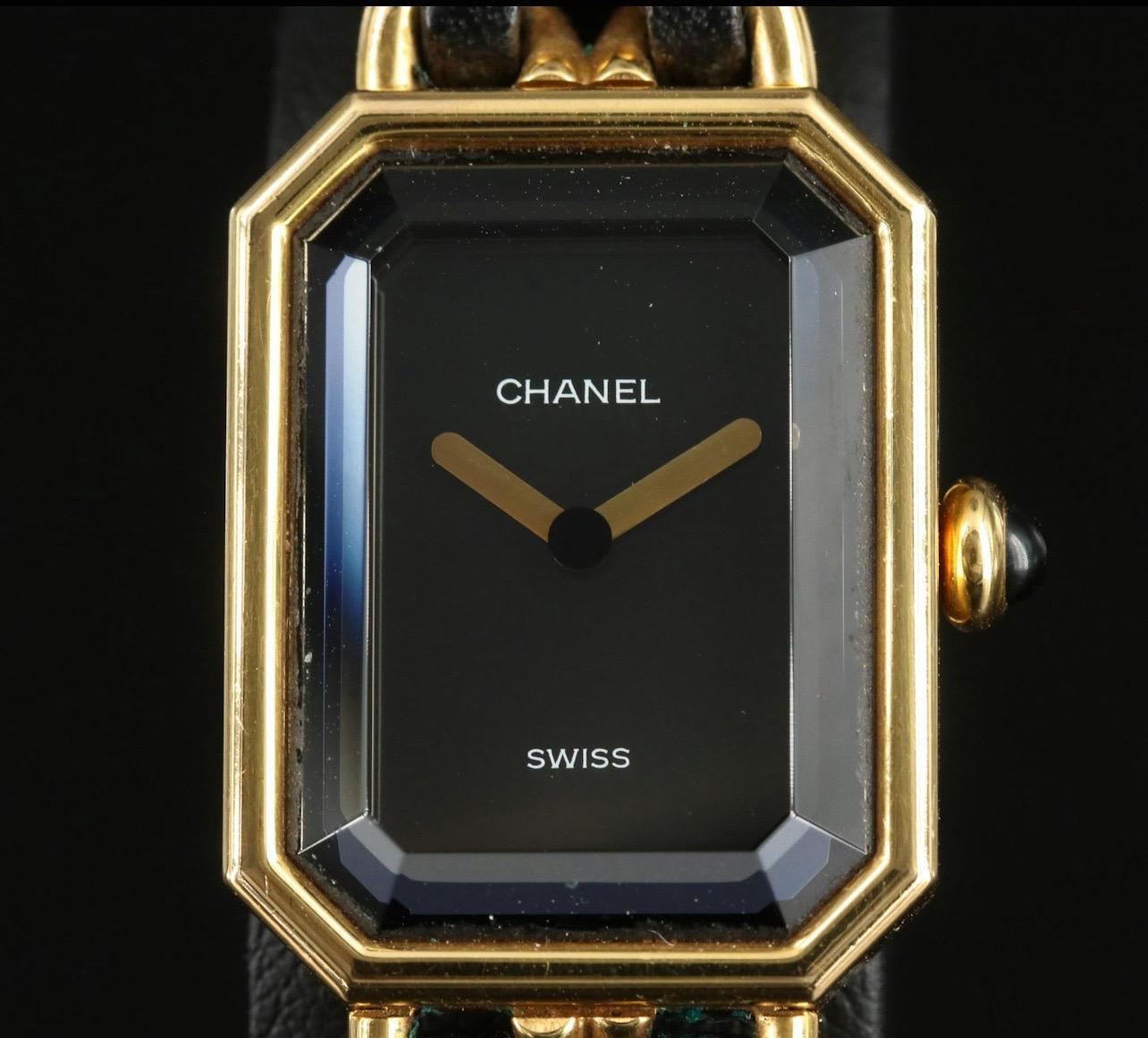 The Chanel 1987 Premiere 20mm Rock Quartz & Gold-Plated Chain Wrist Watch is a stunning timepiece that embodies the elegance and sophistication synonymous with the Chanel brand. Crafted from stainless steel, this watch showcases a luxurious