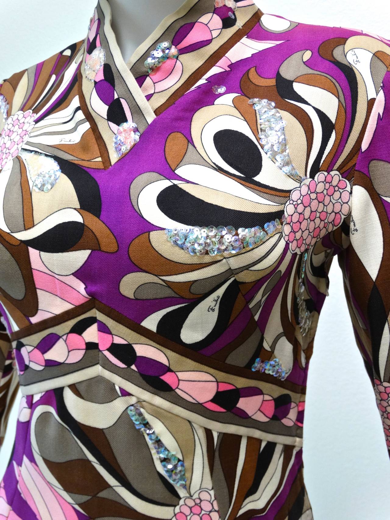 Fantastic 1960’s Pucci dress with iridescent sequins ( on the front only) is made from wool, printed with an iconic mod graphic in shades of violet, fuchsia, baby pink, dark brown, beige and white. This dress is constructed with so many details, it