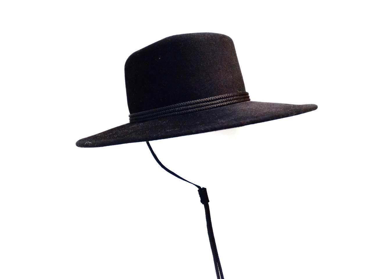This wonderful 1980's hand-crafted Bolero Hat from Adolfo II for Saks Fifth Avenue is made of 100% wool and has spanish Sombrero Cordobe feel. The sombrero cordobés is a traditional hat made in the city of Córdoba, Spain. Made in the USA this is a