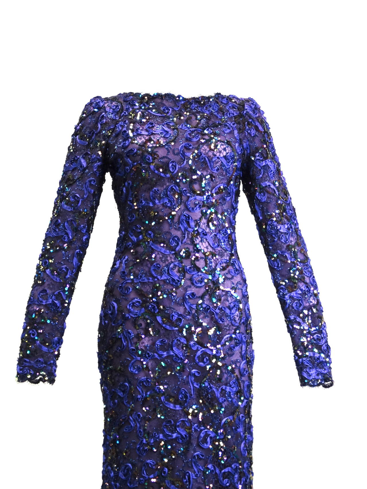 This is a stunning Oscar De La Renta jeweled tone purple and lace Sequin Gown - Circa 1980's for Capriccio, this Gown is a size 8 and is covered in deep purple and iridescent sequins. Absolutly Stunning, please inquire with any further