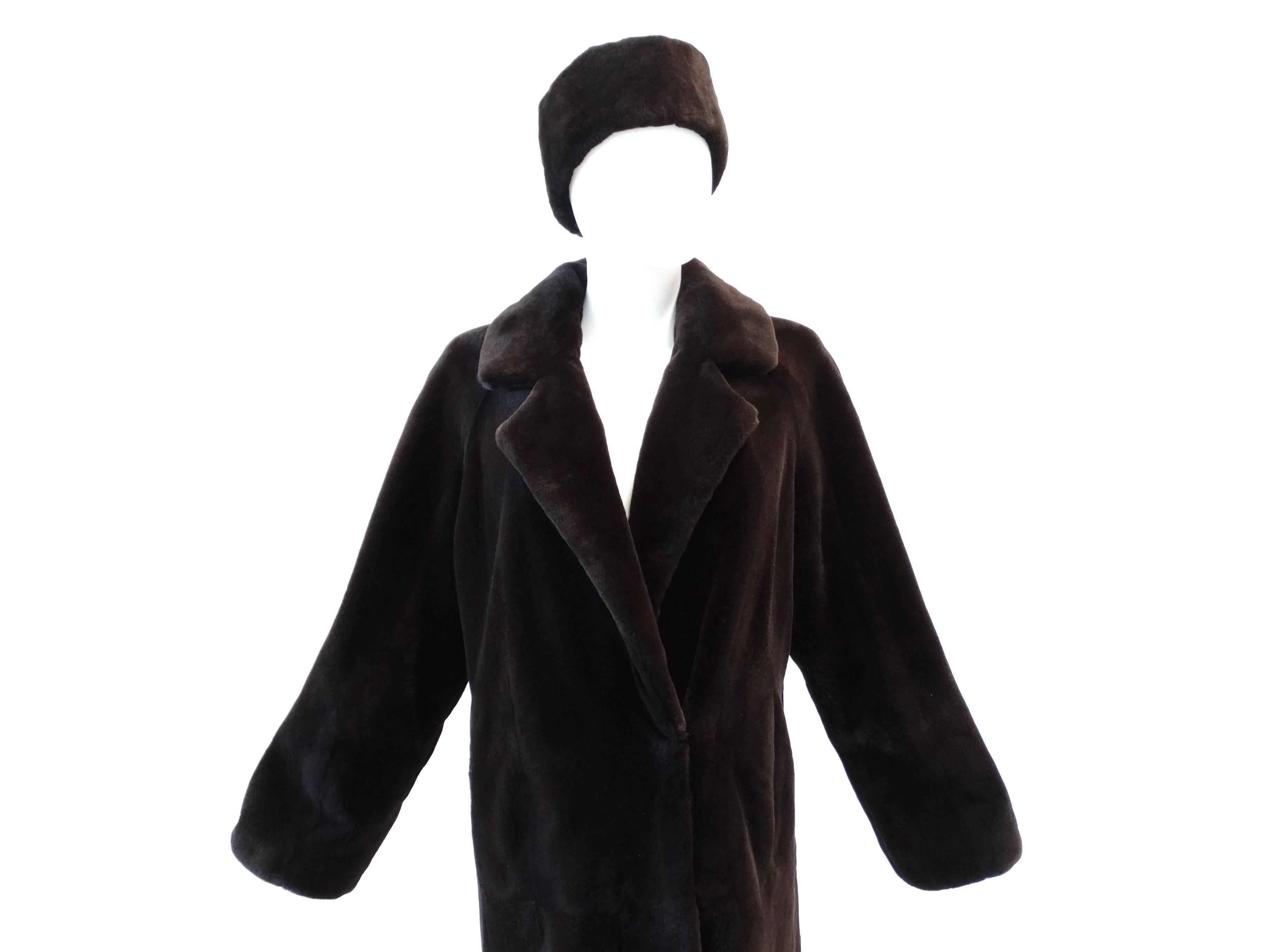 A beautiful dyed Matara full length coat designed by Michael Kors for Albert Furs in Aspen Colorado. Lined in silk, this coat is butter soft and is in a deep dark chocolate color. Coat has 3 hook closures.  It will come with an appraisal certificate