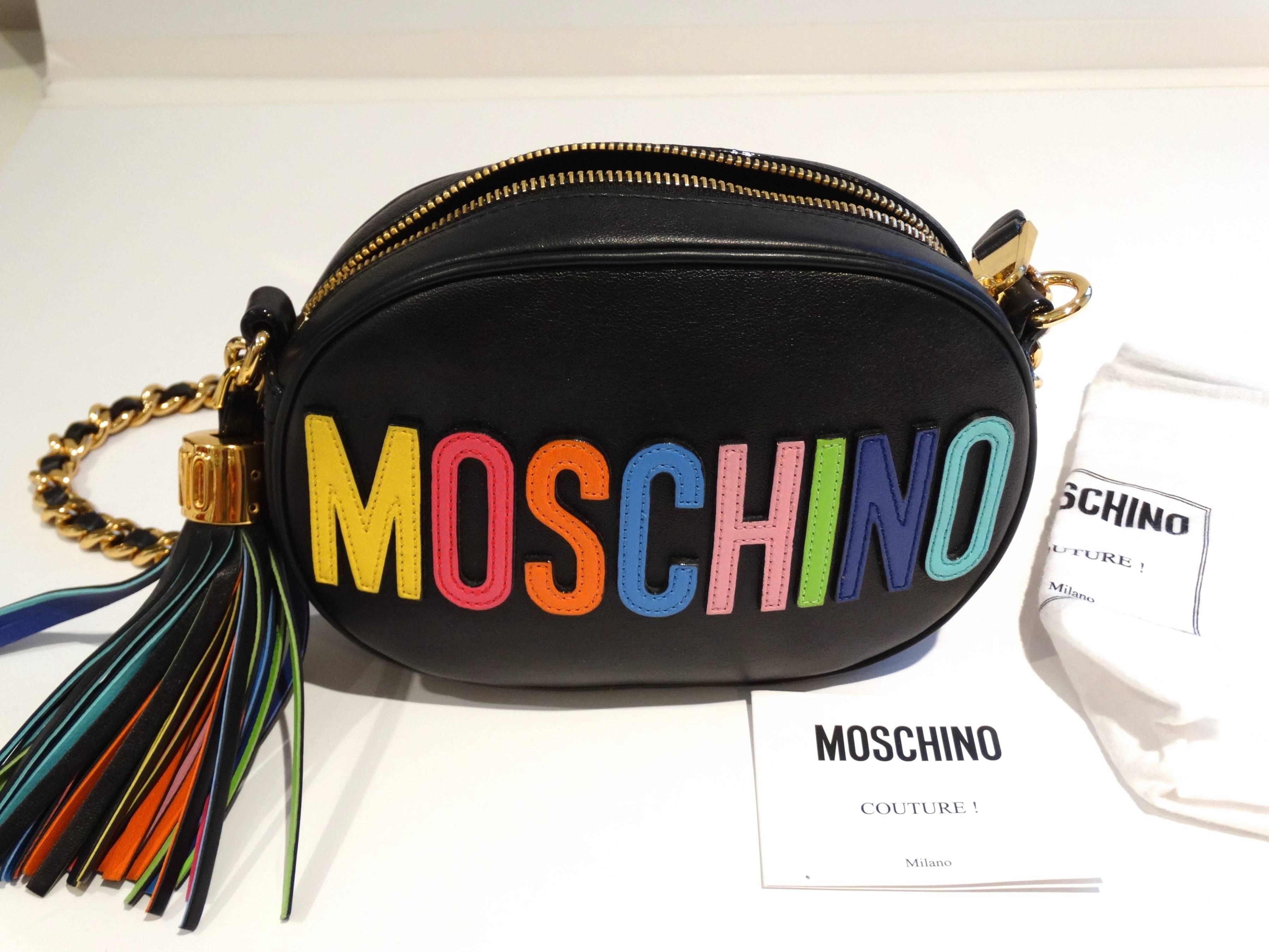 Celebrate Jeremy Scott's Moschino Spring '15 Runway Capsule Collection with this logo-licious crossbody featuring a sized-down silhouette and rainbow-hued letters. A chain-and-leather strap and swishy tassel deliver plenty of street-style swag to