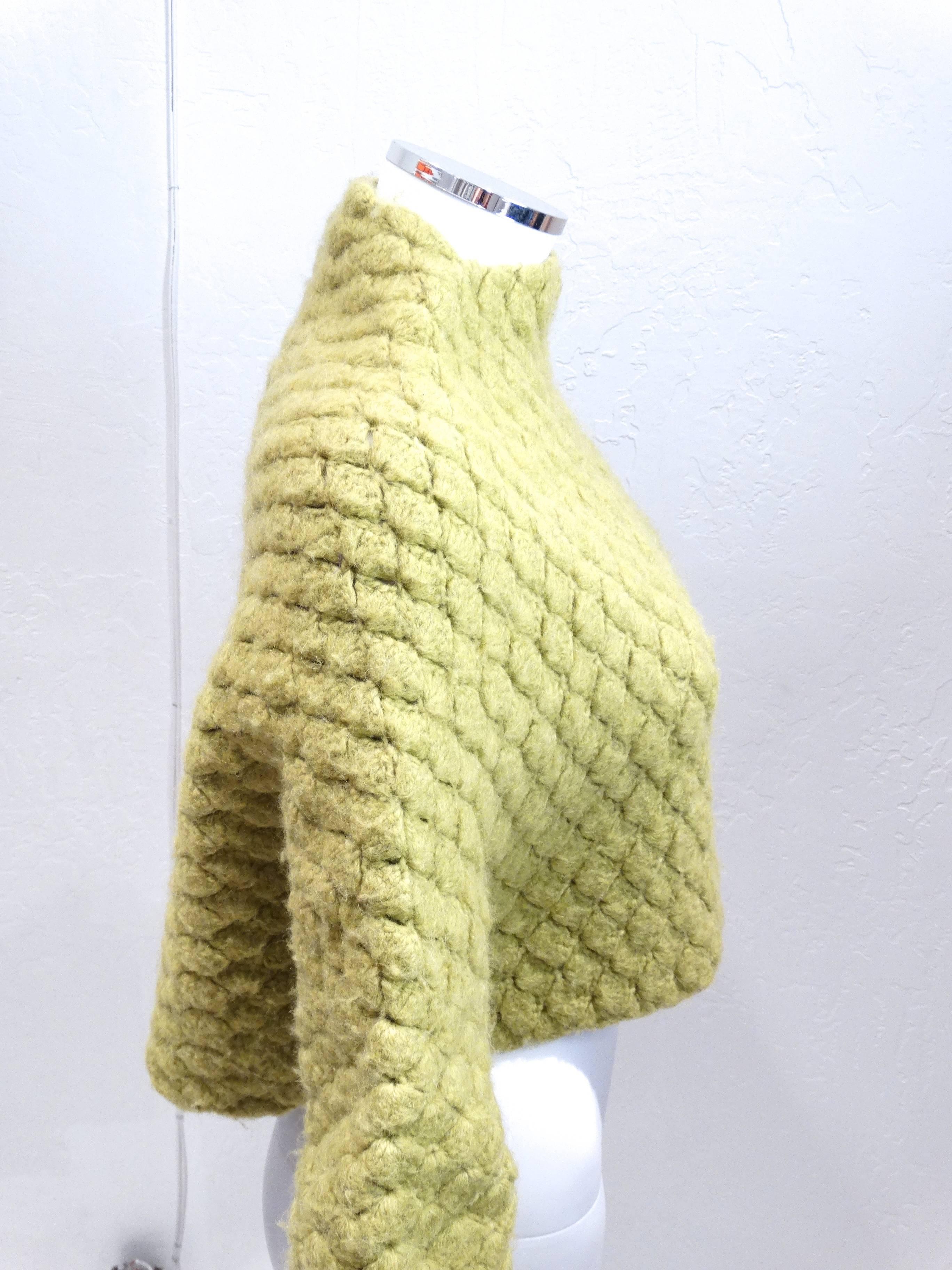 From AKIRA ISOGAWA 1998 Autumn/Winter Runway collection this is fabulous knit cropped sweater with extra long arms. Heavy knit in a chartreuse green, marked a size small. 
Measurements: 
34