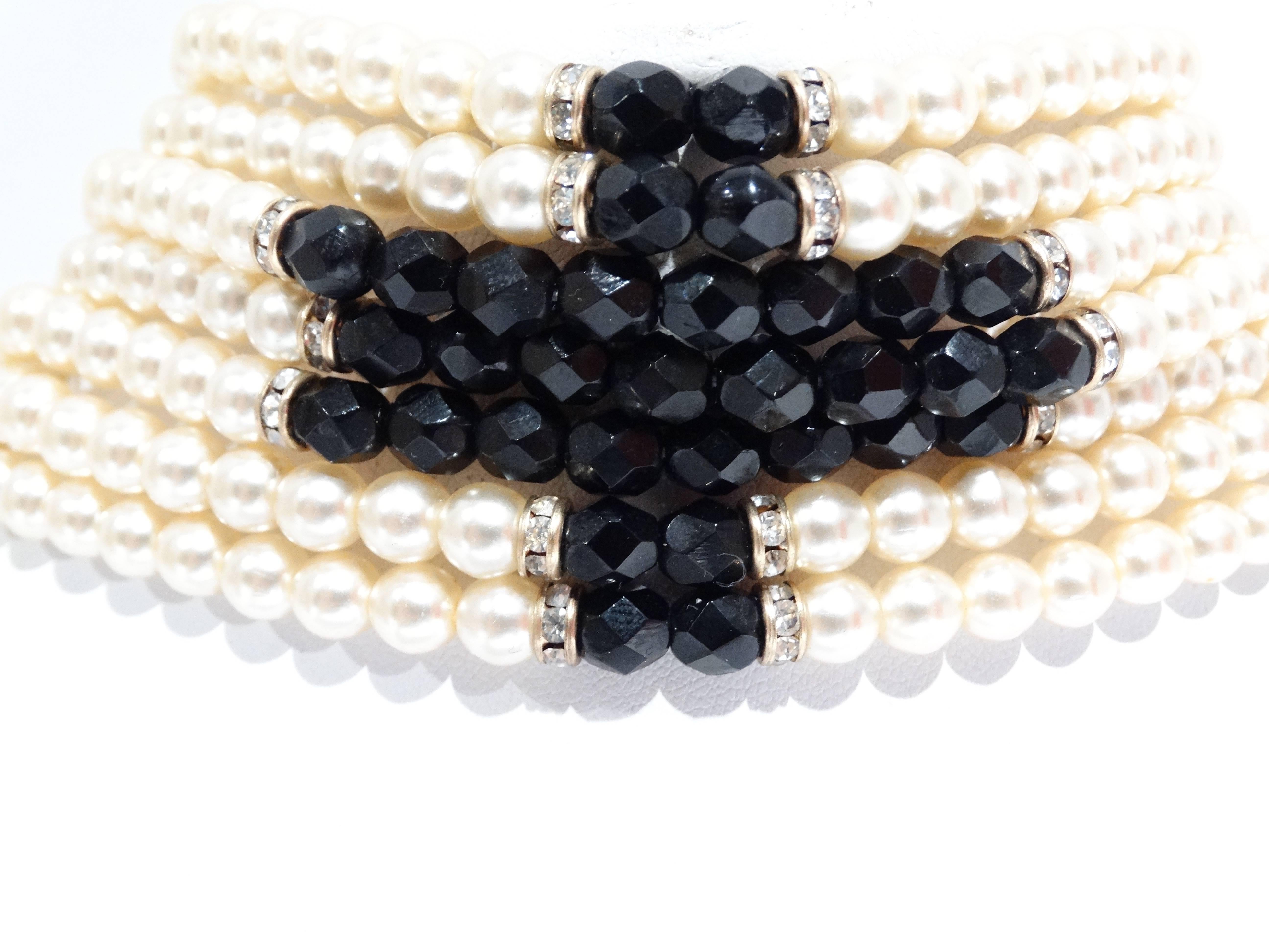 Stunning Akoya Cultured Pearl (ACP) choker necklace with Black Crystal Beads. This choker is a fabulous statement piece with hook closure, can be adjusted for size. Mint condition.
Measures 12.5