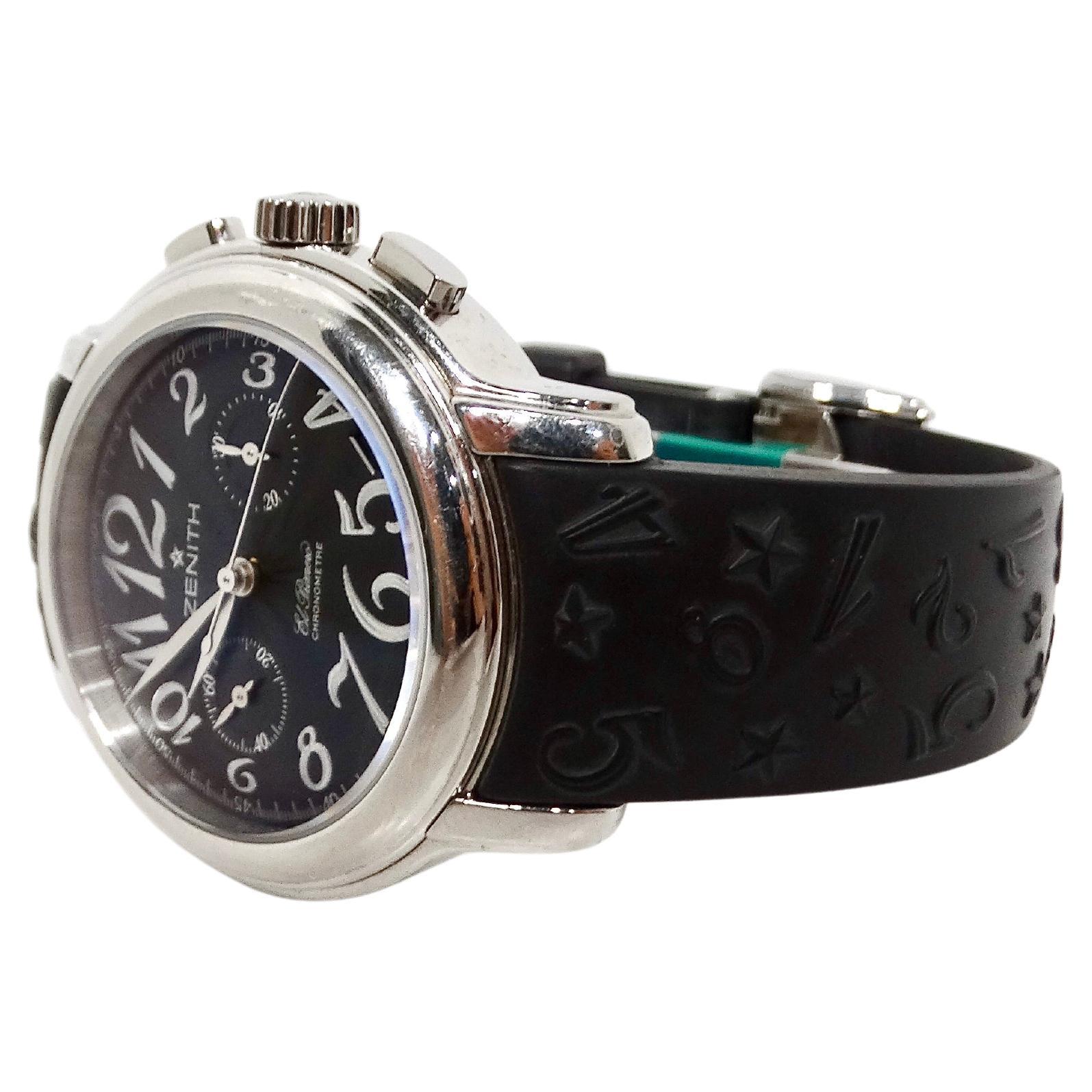 El Reloj de pulsera Zenith Star El Primero Chronomaster de acero inoxidable es un reloj sofisticado que encarna la precisión y la elegancia. Su caja redonda, fabricada en acero inoxidable duradero, alberga una elegante esfera negra que desprende un