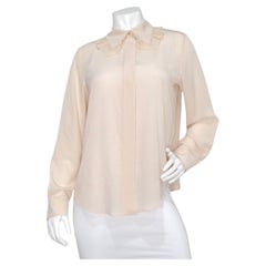 Chloe Light Pinky Beige Ruffled Collar Silk Blouse With Black Bow Detail