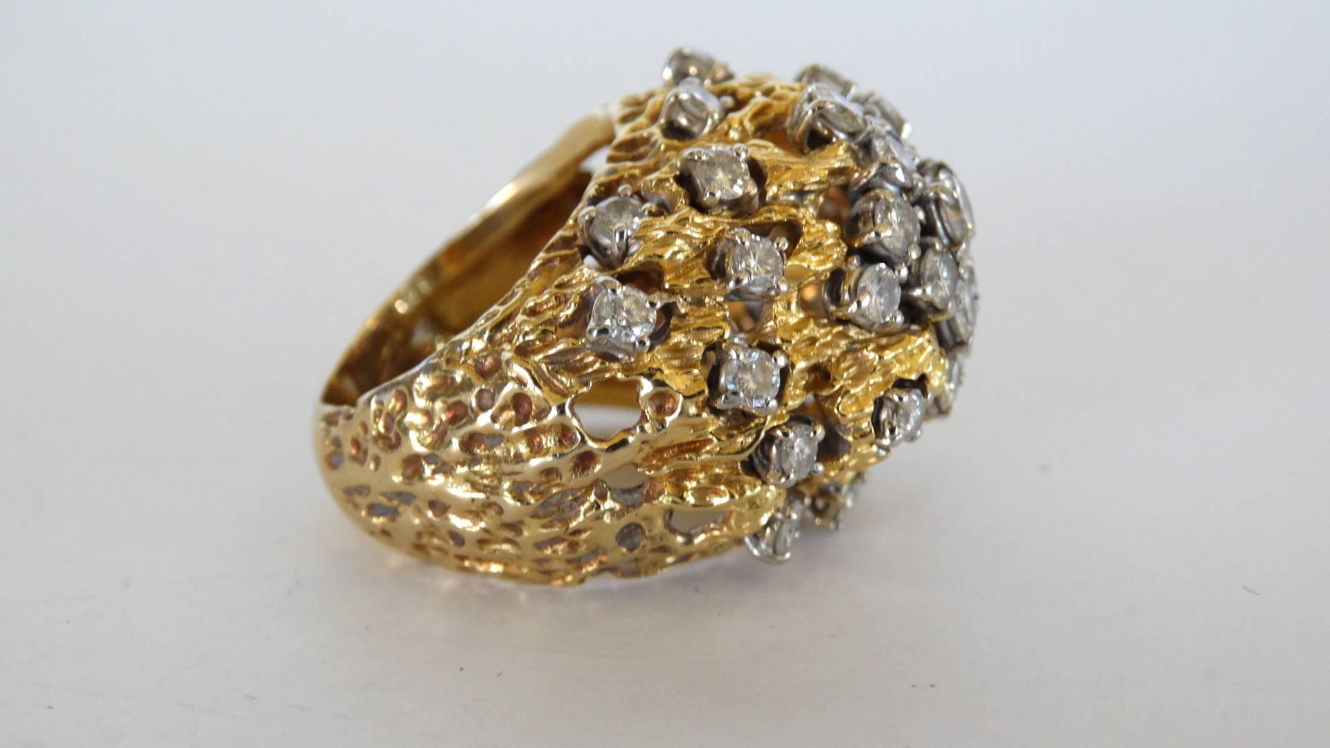 A beautiful custom made diamond nugget ring from the 70's. This ring has 3 carat weight of brilliant white diamonds and is set in 18k yellow gold. The ring is a size 6 Total gram weight is 16.74. 34 round brilliant cut diamonds. 