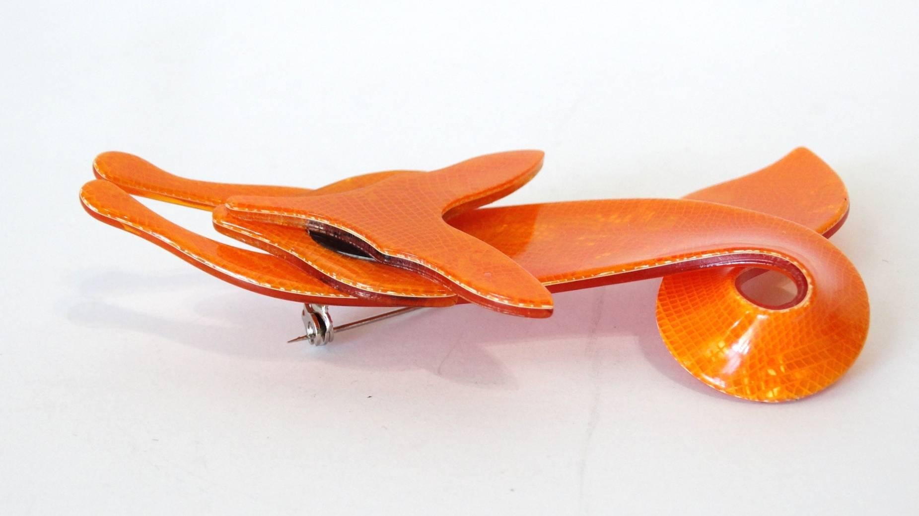 Are you the Foxiest of them all? Beautiful Fox pin/brooch Designed by French artist Lea Stein, this vintage, one-of-a-kind crawling fox dates to the late 1970's.The perfect fashion addition in Foxy Orange with Black Eyes 100% celluloid and Made in