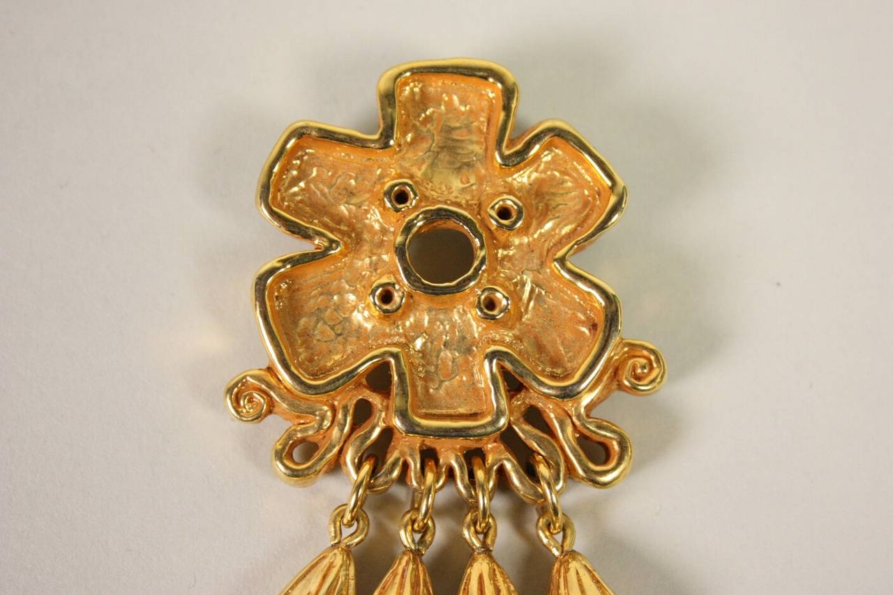 Gold-toned brooch from Christian Lacroix likely dates to the 1990's.  It measures 5 1/4