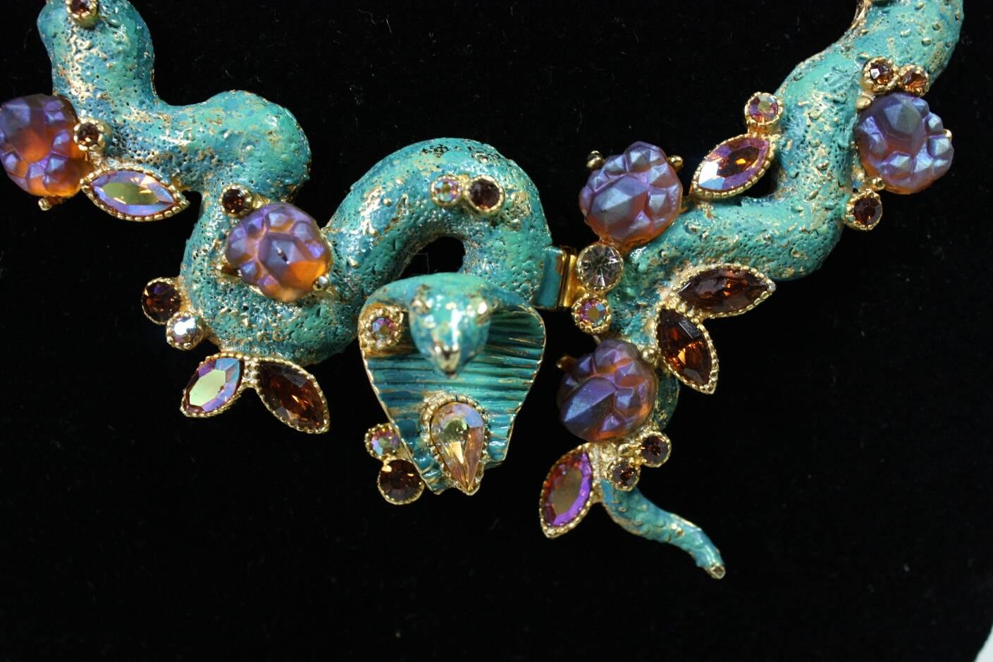 This vintage HAR (short for Hargo Creations) cobra necklace, bracelet and earrings book piece dates to the late 1950's. Light teal green enamel is accented with glass and aurora borealis rhinestones. This iconic design was made exceptionally well.