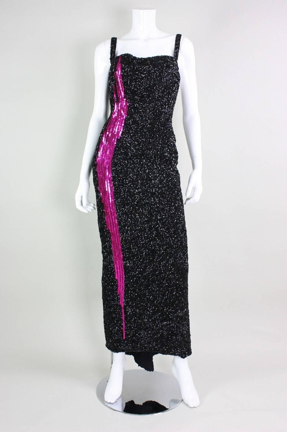 Vintage gown from Mr. Blackwell dates to the 1950's through early 1960's and is fully covered in black and fuchsia sequins.  Fitted throughout.  Squared bustline with narrow shoulder straps.  Center back zipper.  Fully lined.  Back vent in