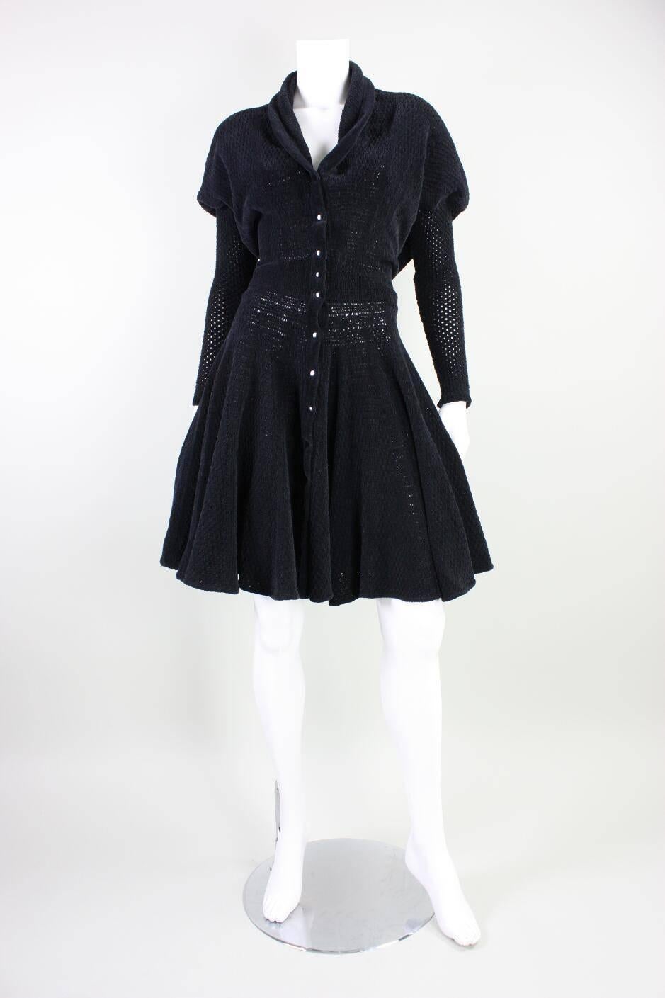 Vintage dress from Azzedine Alaia dates to the 1980's and is made of a soft cotton chenille.  Bodice has blouson styling that extends into the sleeves. Dress is fitted at the waist and has a full skirt.  Interior waistband.  Unlined.  Center front