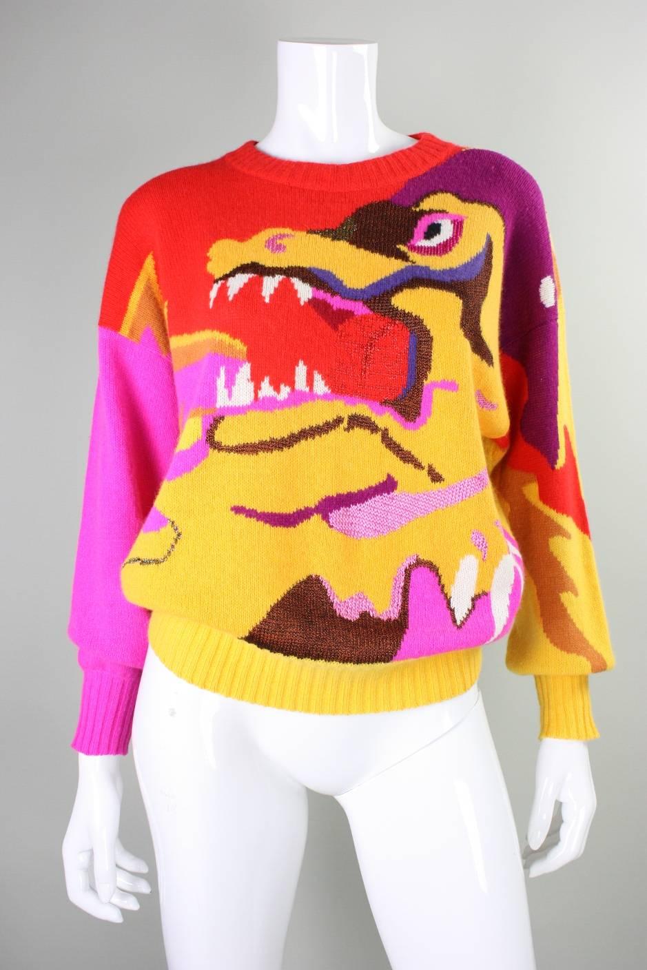Vintage sweater from Krizia dates to the 1980's and depicts a ferocious creature who appears to be in mid-roar.  It is made of brightly-colored wool and has ribbed collar, cuffs, and waistband.  Unlined.  No closures.