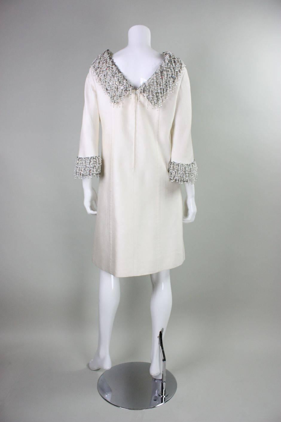 Women's 1960's Cream Cocktail Dress with Heavily Beaded Fringed Trim For Sale