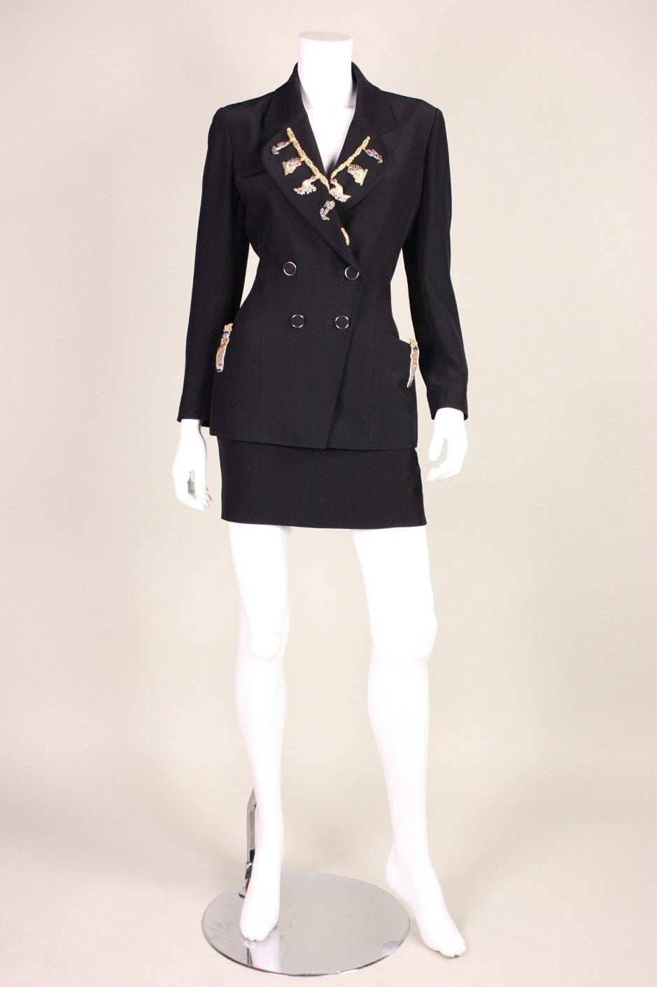 1990's Karl Lagerfeld Embellished Suit

Both pieces are labeled a size 40.