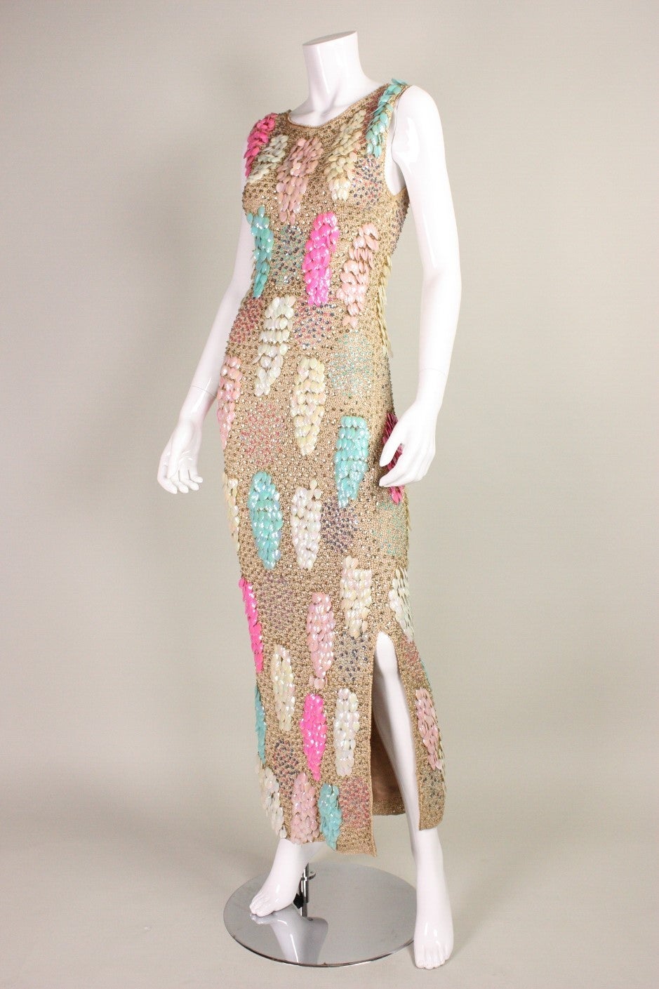 1960's Crocheted & Sequined Gown.

Fits sizes 2-4 US.