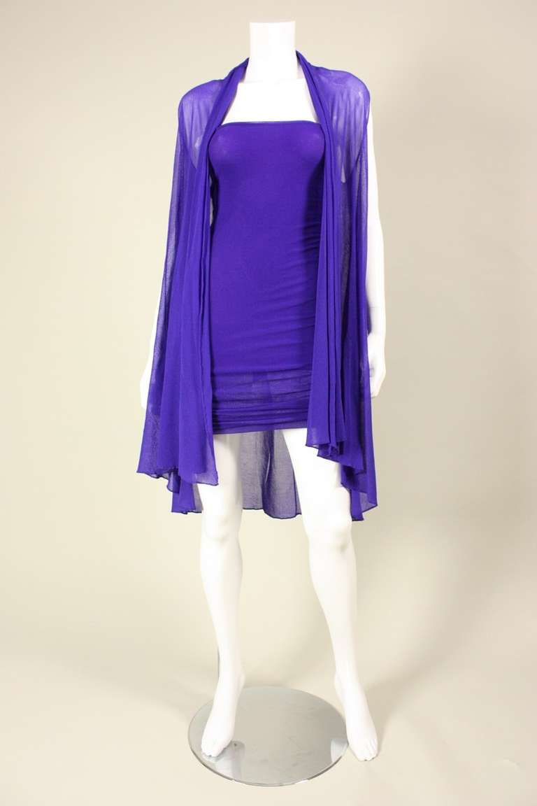 Vintage dress and jacket from Giorgio di Sant Angelo date to the 1970's and are made of purple stretch mesh.  Strapless dress has center back ruching and is shorter in the back than in the front.  Dress and jacket have no closures.  Dress is lined;