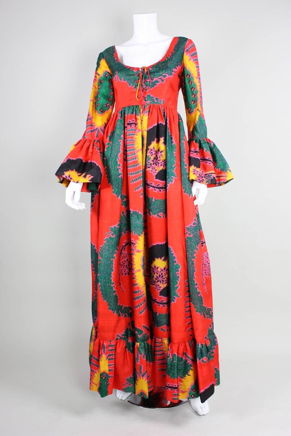 1970's Geoffrey Beene Printed Silk Gown

Bust: 36"
Waist: 26 1/2"
Hips: Open
Across Shoulders: 16 1/2"
Sleeve Length: 24"
Shoulder Seam to Hem Length: 58"