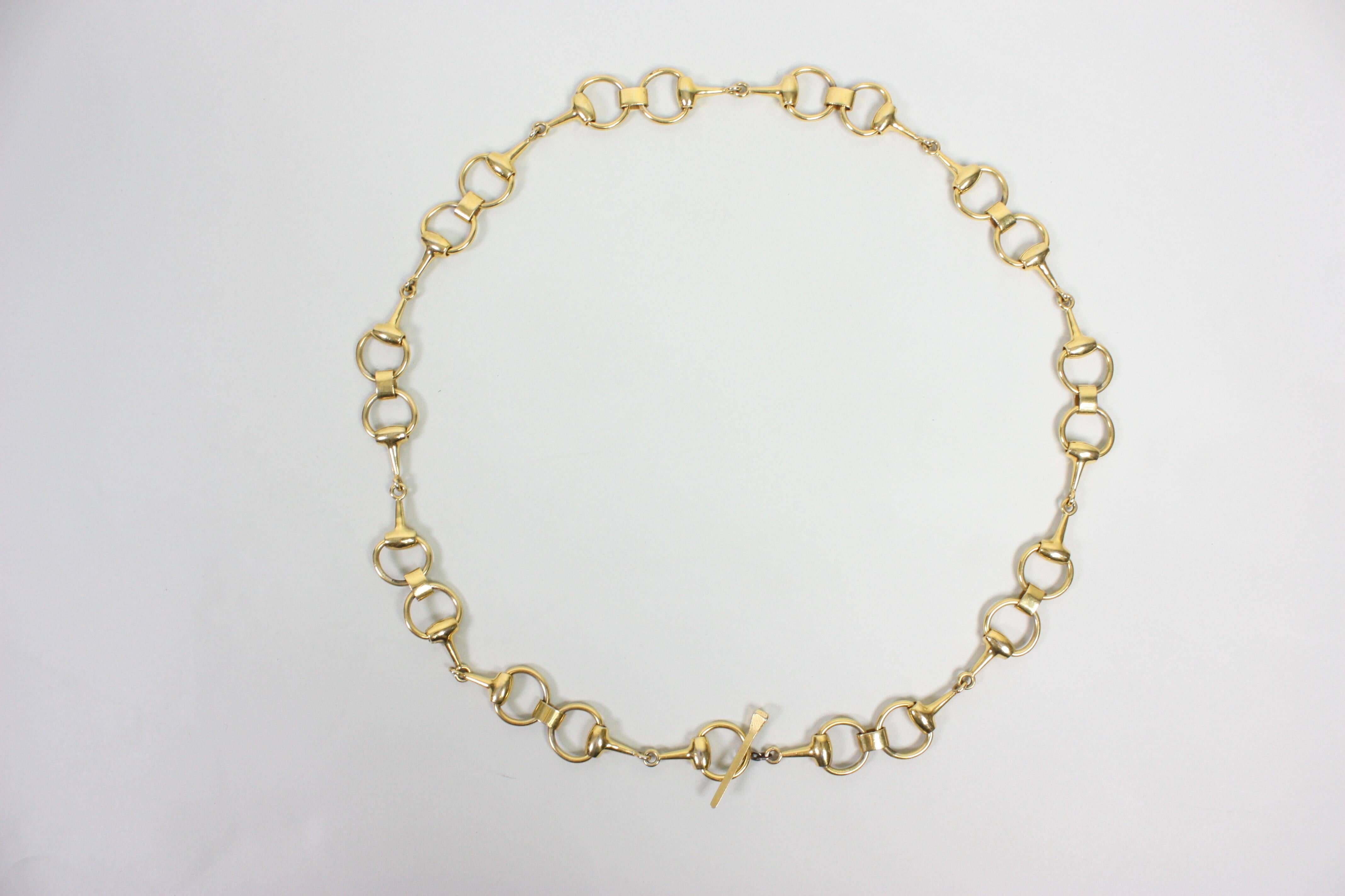 Vintage belt from Gucci dates to the 1970's and is made of gold-toned metal.  Horse bit theme.  

Measurements

Overall Length: 36 1/2