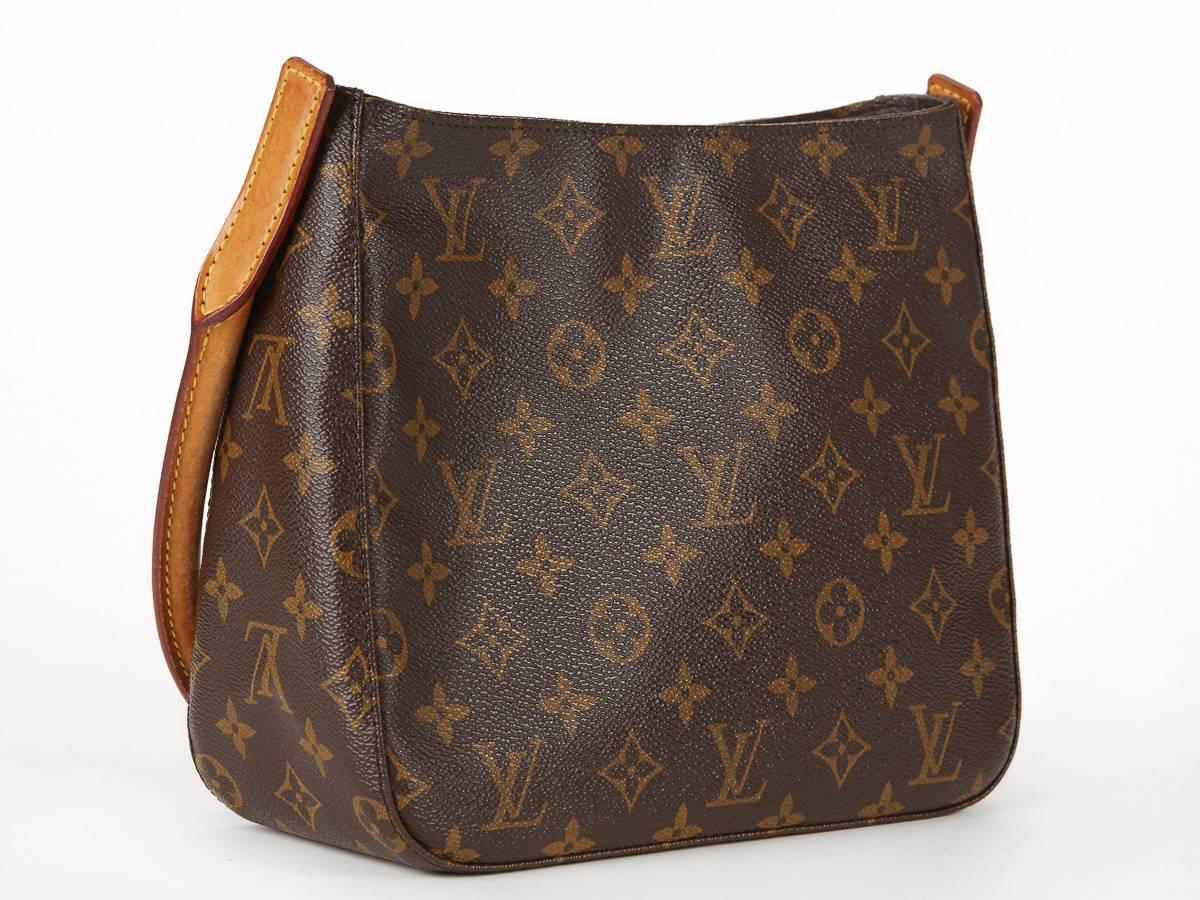 LOUIS VUITTON
BROWN CLASSIC MONOGRAM LOOPING MM

This ladies Louis Vuitton Looping MM is primarily made from brown canvas complimented by gold hardware. This bag is in very good pre-owned condition. Circa 2001. Our  reference is HB209 should you