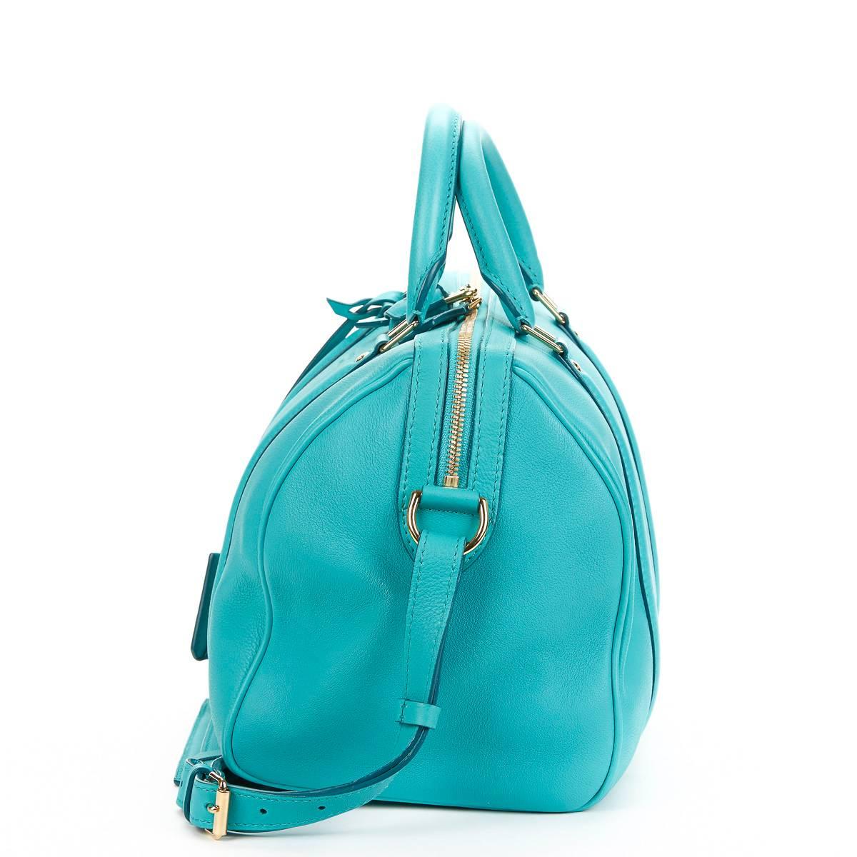 LOUIS VUITTON
Turquoise Calfskin Sofia Coppola PM

This LOUIS VUITTON Sofia Coppola PM is in Excellent Pre-Owned Condition accompanied by Louis Vuitton Dust Bag, Care Booklet, Tag, Padlock, Keys, Clochette. Circa 2011. Primarily made from